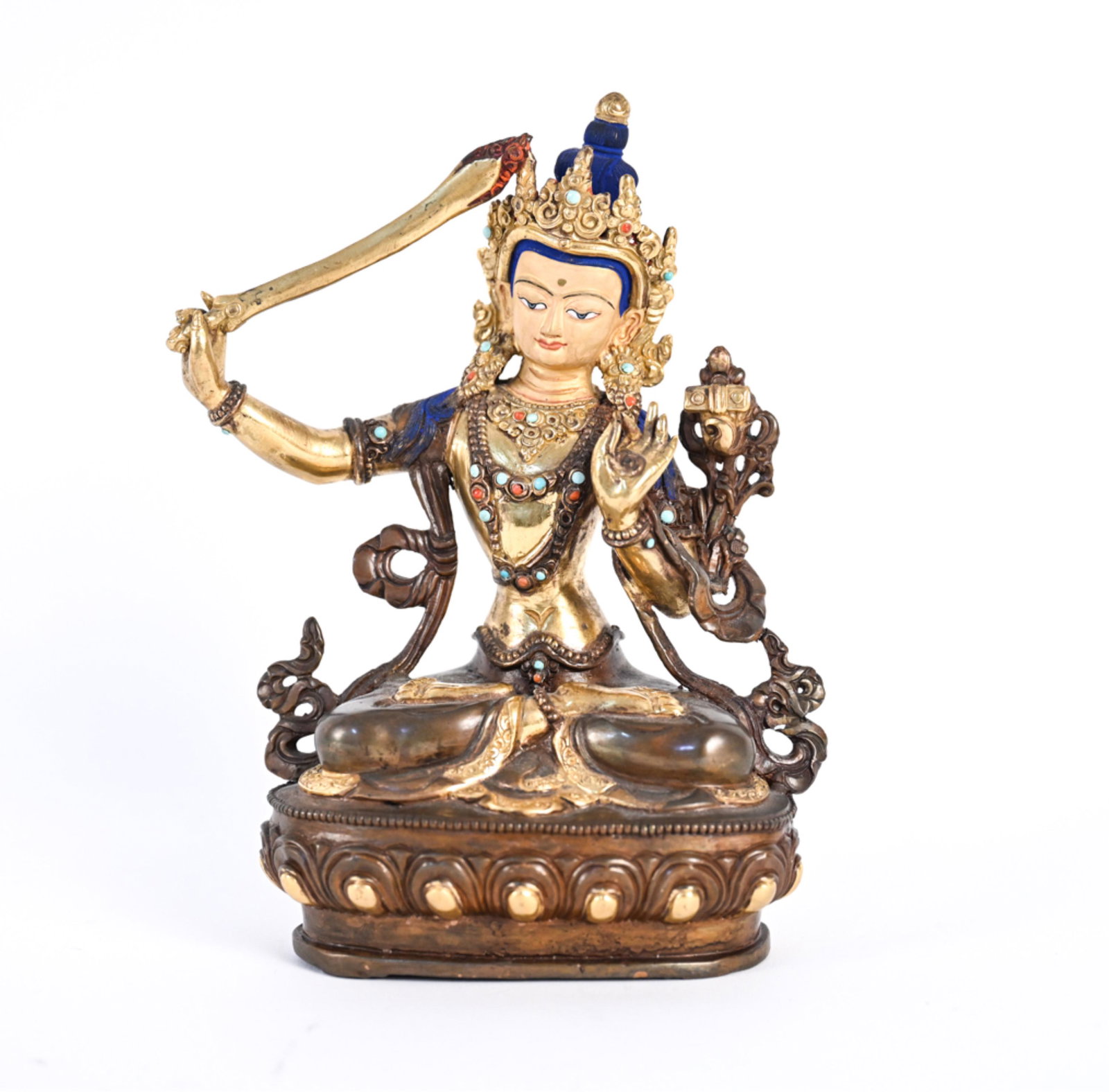 MODERN SEATED BUDDHIST FIGURE: Copper, brass, with painted surface and faux gemstones. Marked underneath. Dimensions: H 8.5" x W 6.5" x D 3.25" Condition: Some handling marks.