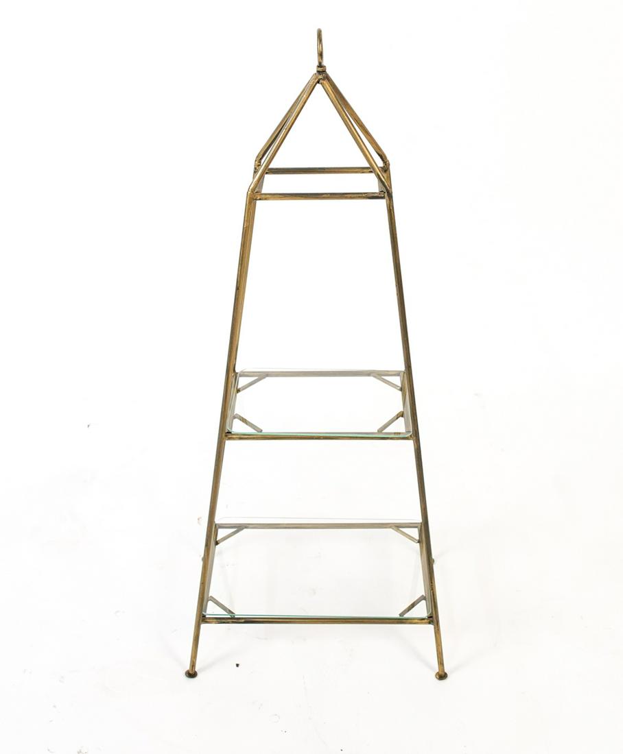 PETITE OBELISK FORM ETAGERE: Two glass shelves. Dimensions: H 38" x W 25.5" x D 10.75" Condition: Flea bites to glass.