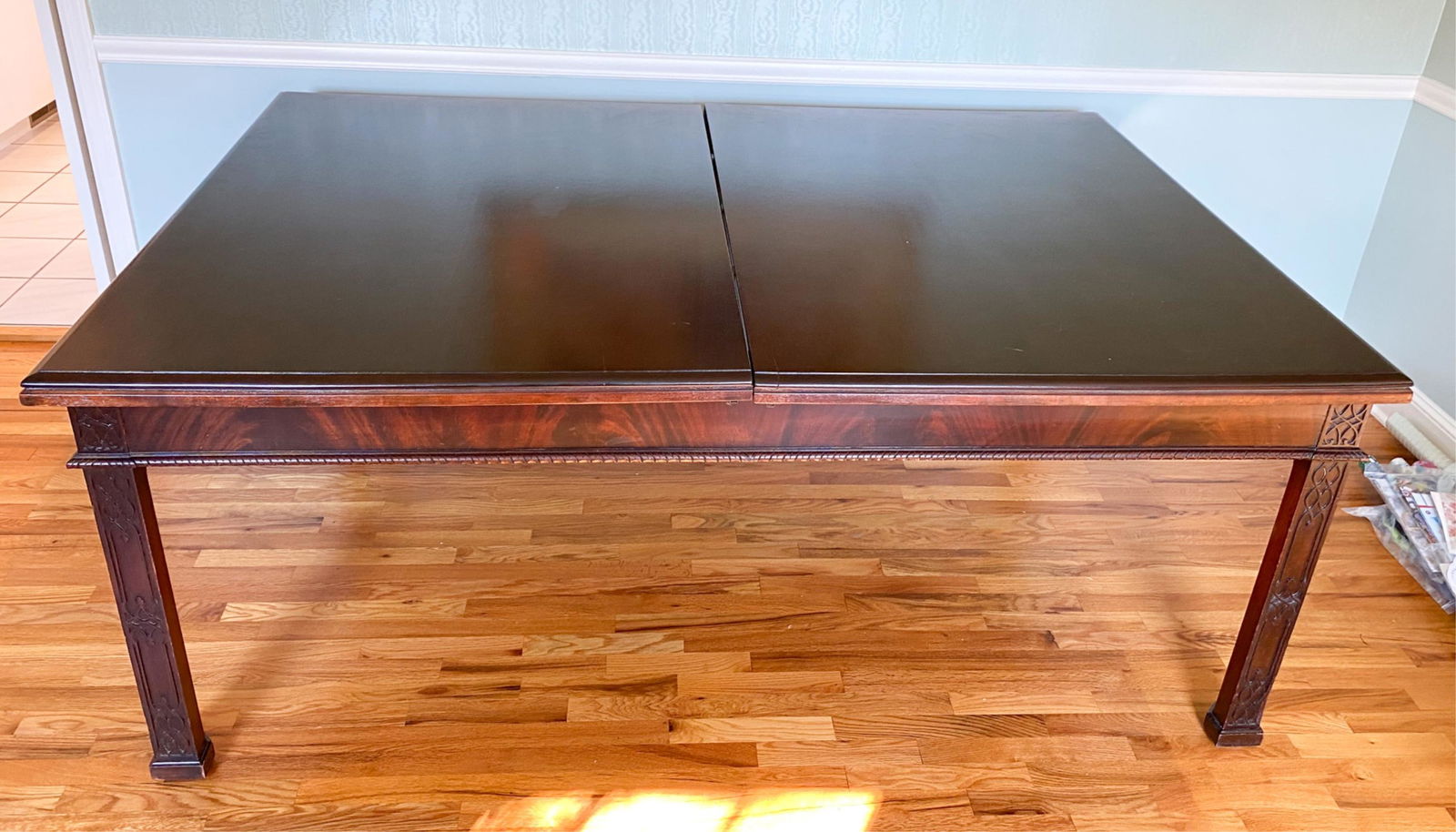 MAHOGANY DINING TABLE: Including (2) 15" leaves and table pads. Dimensions: (Without leaves) H 31" x W 77" x D 54" Condition: Some nicks, dings, rubbing to legs. Some wear to top consistent with use.