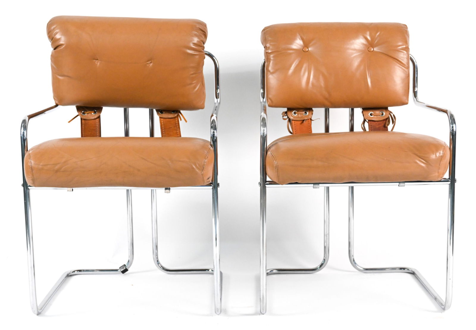 PAIR OF FALESCHINI FOR MARIANI PACE TUCROMA CHAIRS: (2) Iconic "Tucroma" chrome and leather chairs designed by Guido Faleschini and manufactured by Mariani for the Pace Collection c. 1970's/1980's. Stamped Made in Italy on chrome. Dimensions: H 32" x W