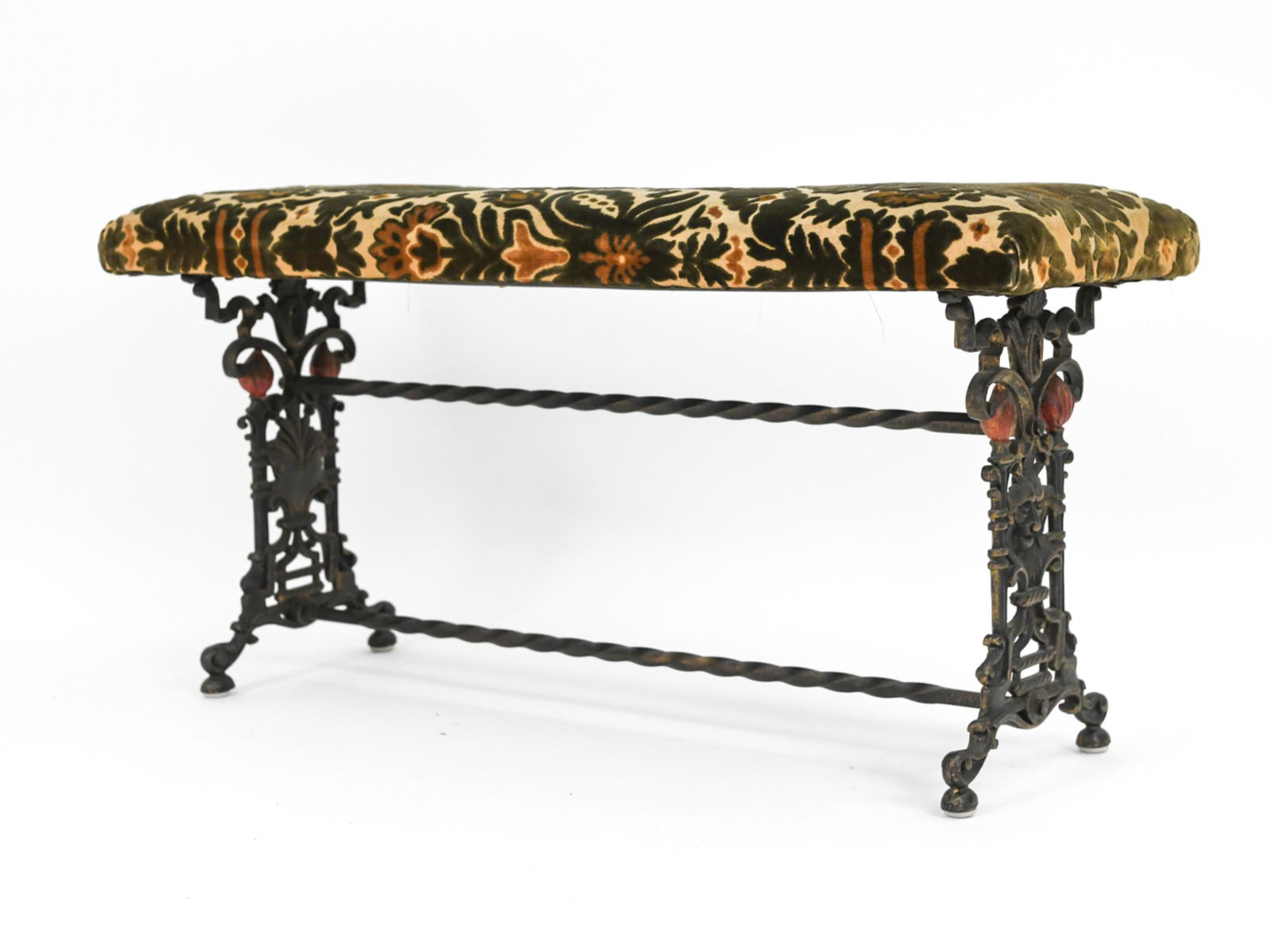 CAST IRON AND UPHOLSTERED FIREPLACE BENCH: Dimensions: H 18" x W 36" x D 12.5" Condition: Showing normal signs of use.