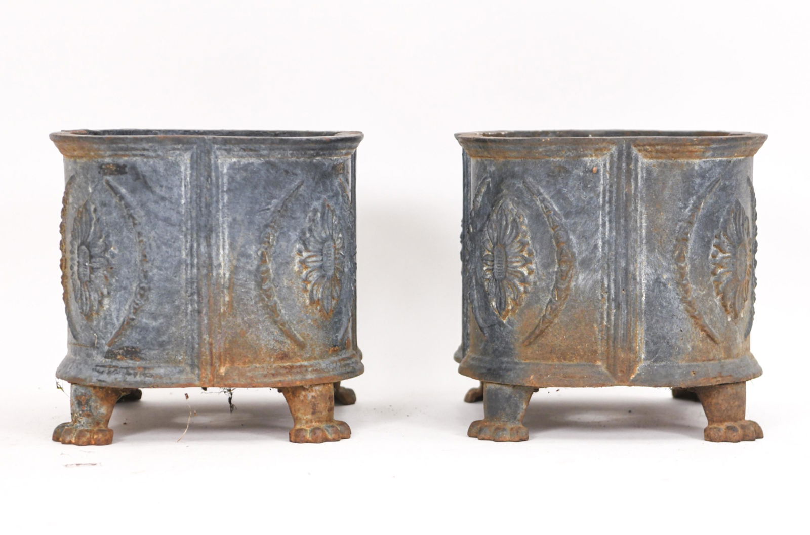 PAIR OF ANTIQUE CAST IRON FOOTED PLANTERS (1 of 9)