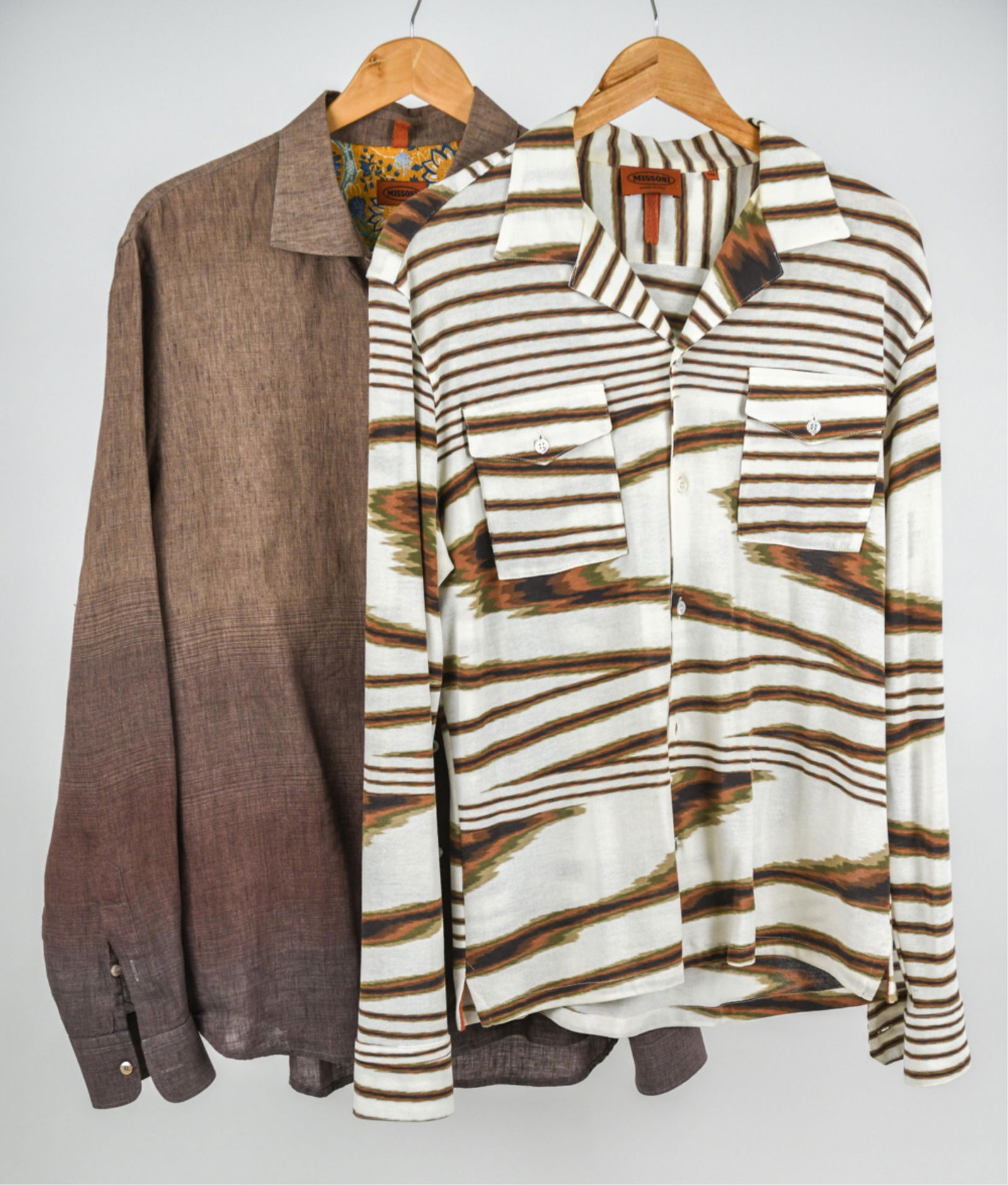 (2) CONTEMPORARY MISSONI BUTTON DOWN SHIRTS, L/XL: Grouping of (2) stylish contemporary Missoni shirts, including: 1970's-style cotton jersey knit notched-collar shirt with flame stitch stripe print, size IT 50 / approx. chest size 48"; and mauve line