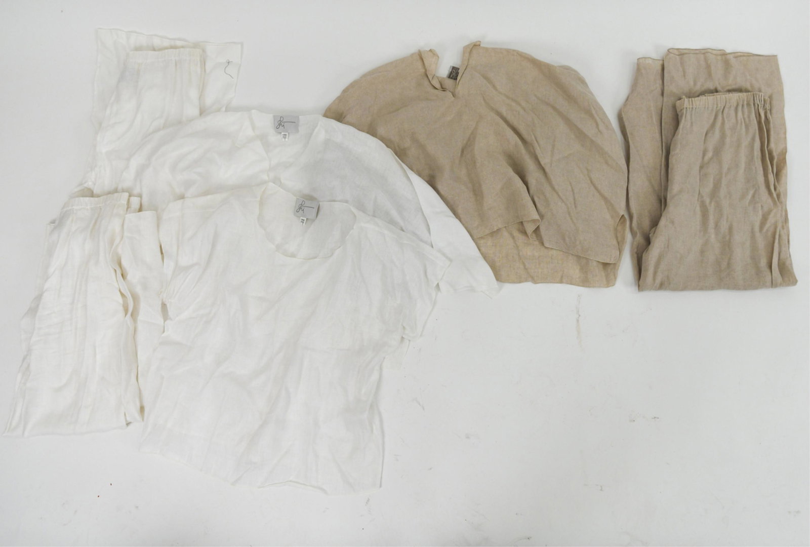 (3) SHI WOMENS LINEN 2 PIECE ENSAMBLES: Shi, 100% linen. Two white sets and one tan set. Size: One size. Condition: Elastic on pants lost its stretch.