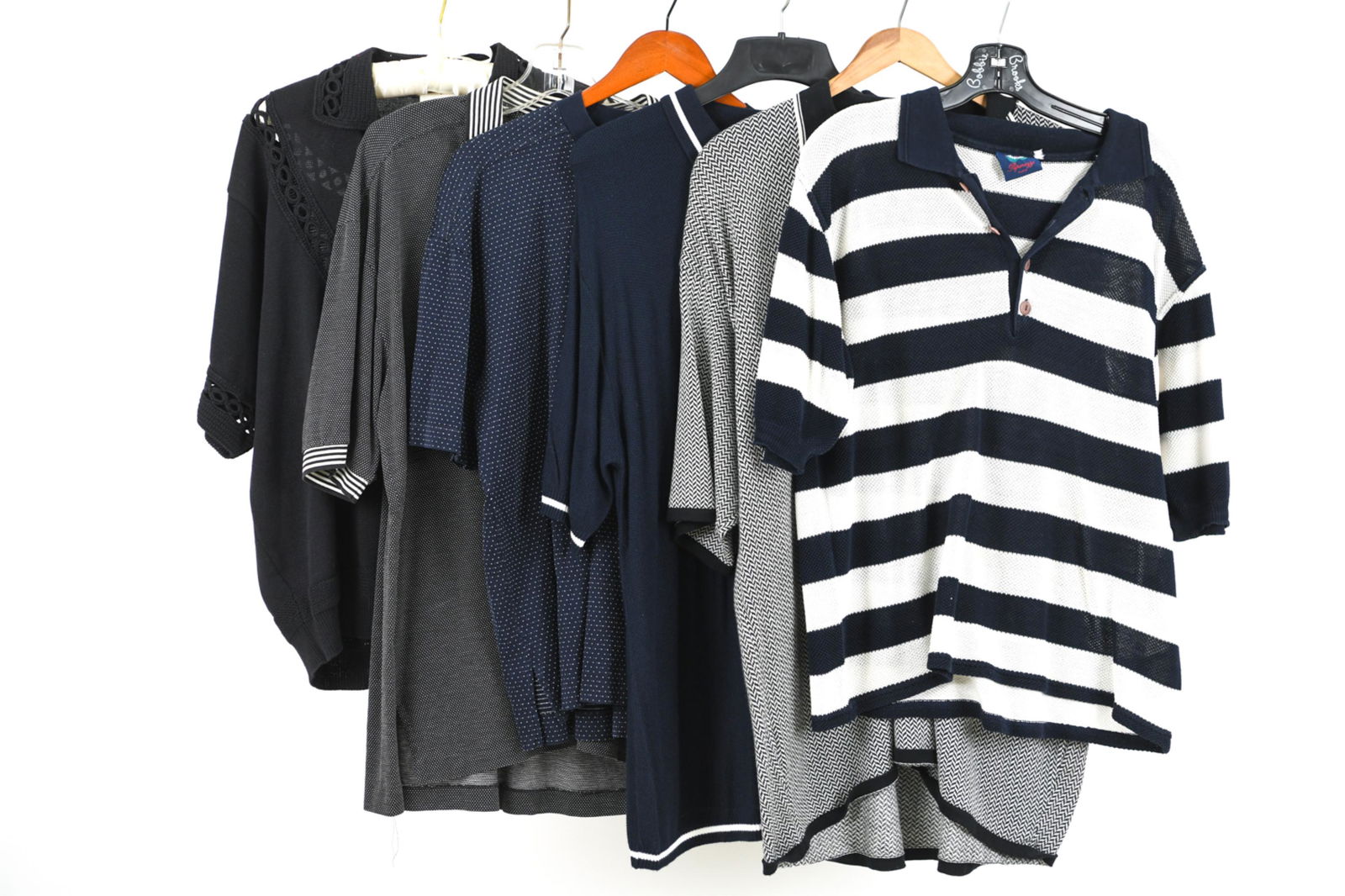 (6) VINTAGE SHORT SLEEVE KNITS; MATSUDA, BYBLOS M: Grouping of (6) timeless designer short sleeve knits from the 1980's, including: Matsuda black eyelet cotton polo sweater, approx. chest size 45"; Byblos black and white cotton nailhead/micro-dot polo