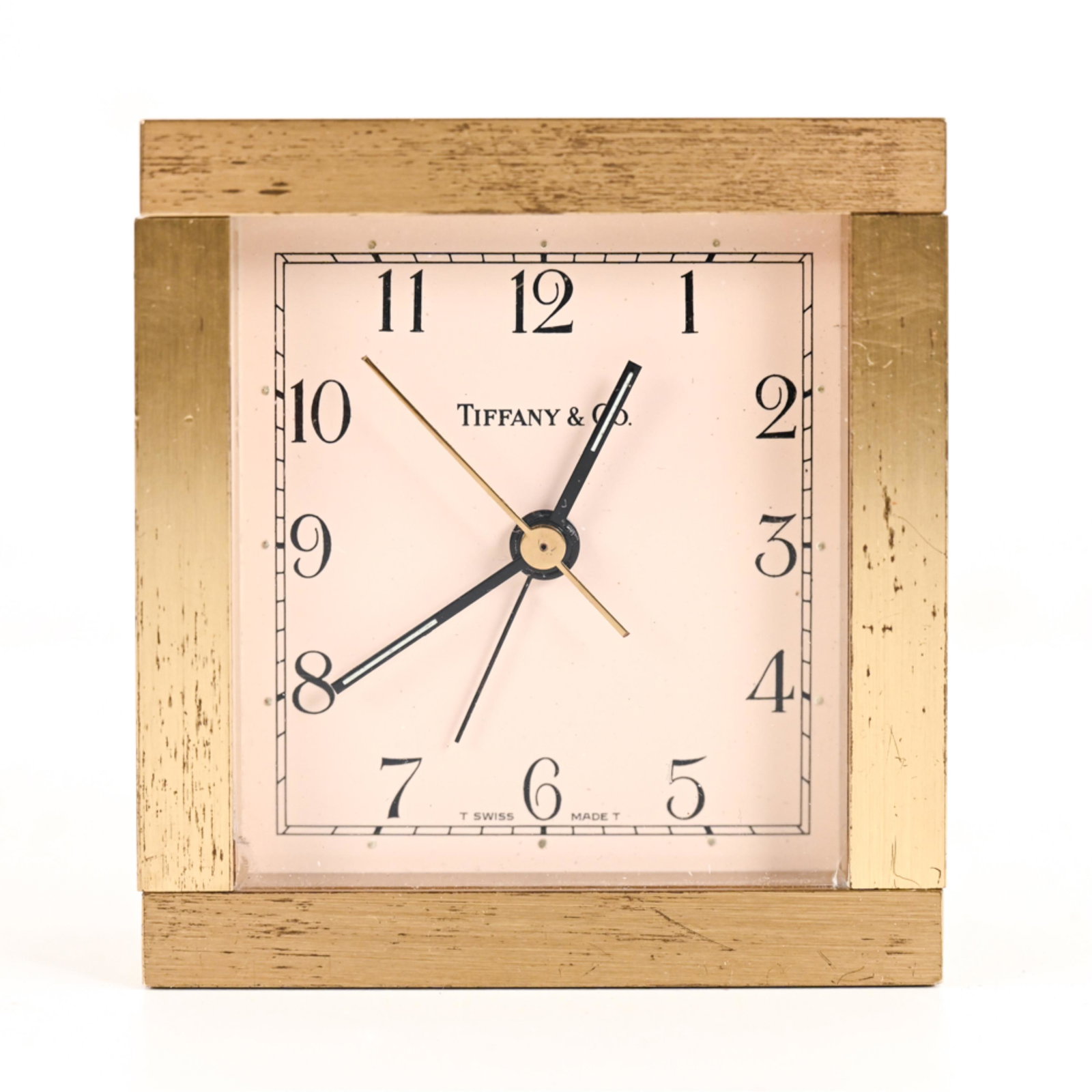 TIFFANY AND CO. DESK CLOCK: Marked Tiffany & Co. to face. Dimensions: H 3.5" x W 3.25" x D 1.25" Condition: Not tested. Some tarnish to case.