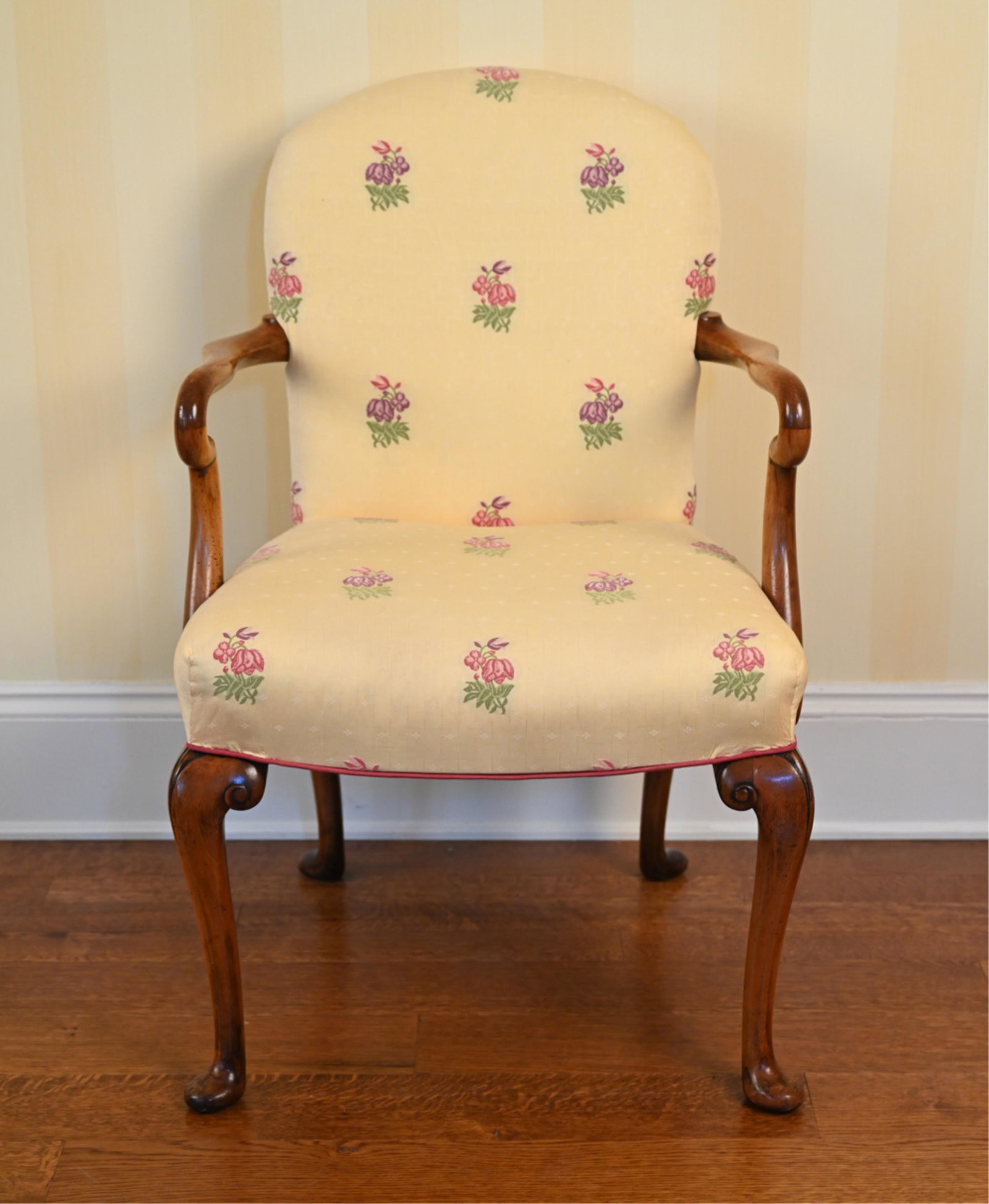 ANTIQUE STYLE ARMCHAIR: Embroidered silk upholstery. Dimensions: H 38" x W 24" x D 25" x SH 19" Condition: Showing light signs of use including some sun fading and a few faint spots to upholstery, a few nicks and scratches a