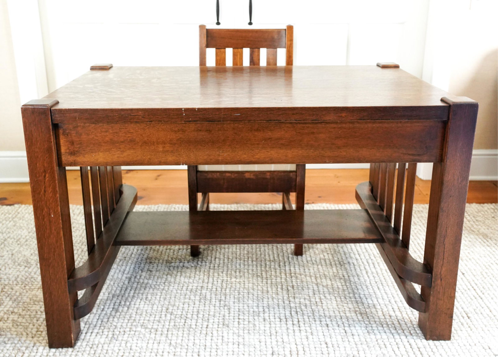 ARTS AND CRAFTS OAK DESK & CHAIR: Apparently unmarked. In Mission/Stickley style. Dimensions: (Desk) H 29.25" x W 48.5" x W 28.5" Condition: Veneer loss between drawer faces. Few small chips. Natural splits to wood. Some finish loss a