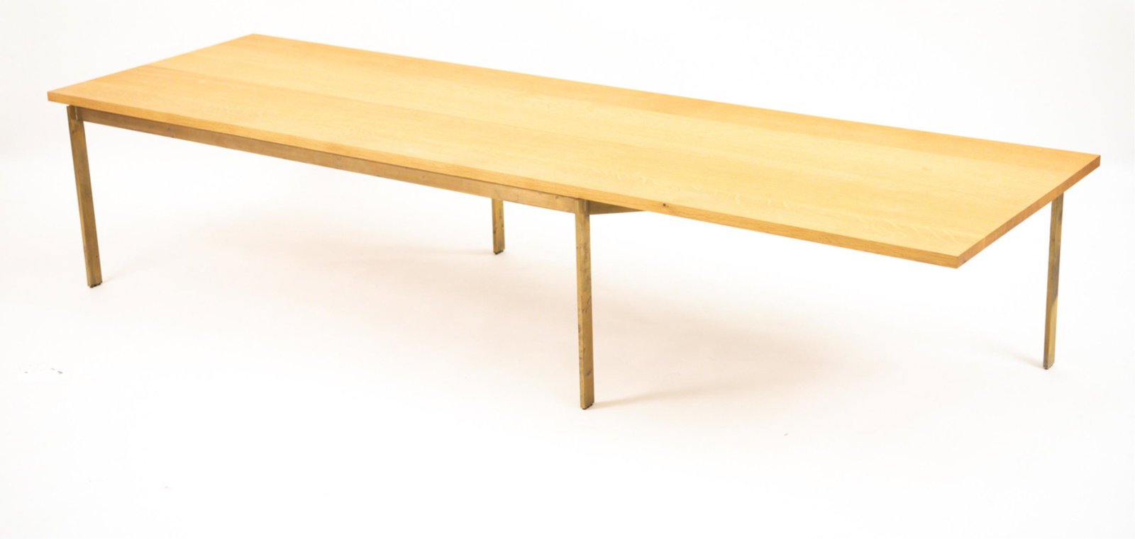 BASSAMFELLOWS PLANK COFFEE TABLE: Contemporary. Model CB-330-198 Plank Coffee Table by Craig Bassam and Scott Fellows, 2004. With solid brass base, heavy oak top. Marked underneath. Originally purchased for $5,000. Dimensions: H 16" x
