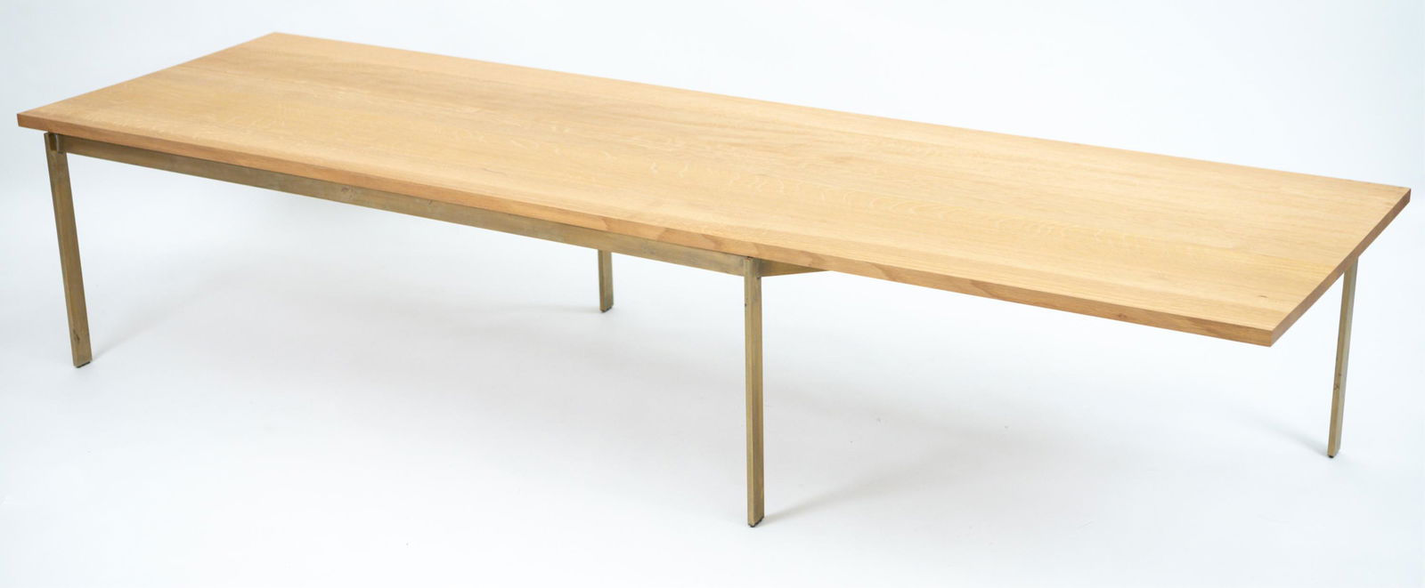 BASSAMFELLOWS PLANK COFFEE TABLE: Contemporary. Model CB-330-198 Plank Coffee Table by Craig Bassam and Scott Fellows, 2004. With solid brass base, heavy oak top. Marked underneath. Originally purchased for $5,000. Dimensions: H 16" x