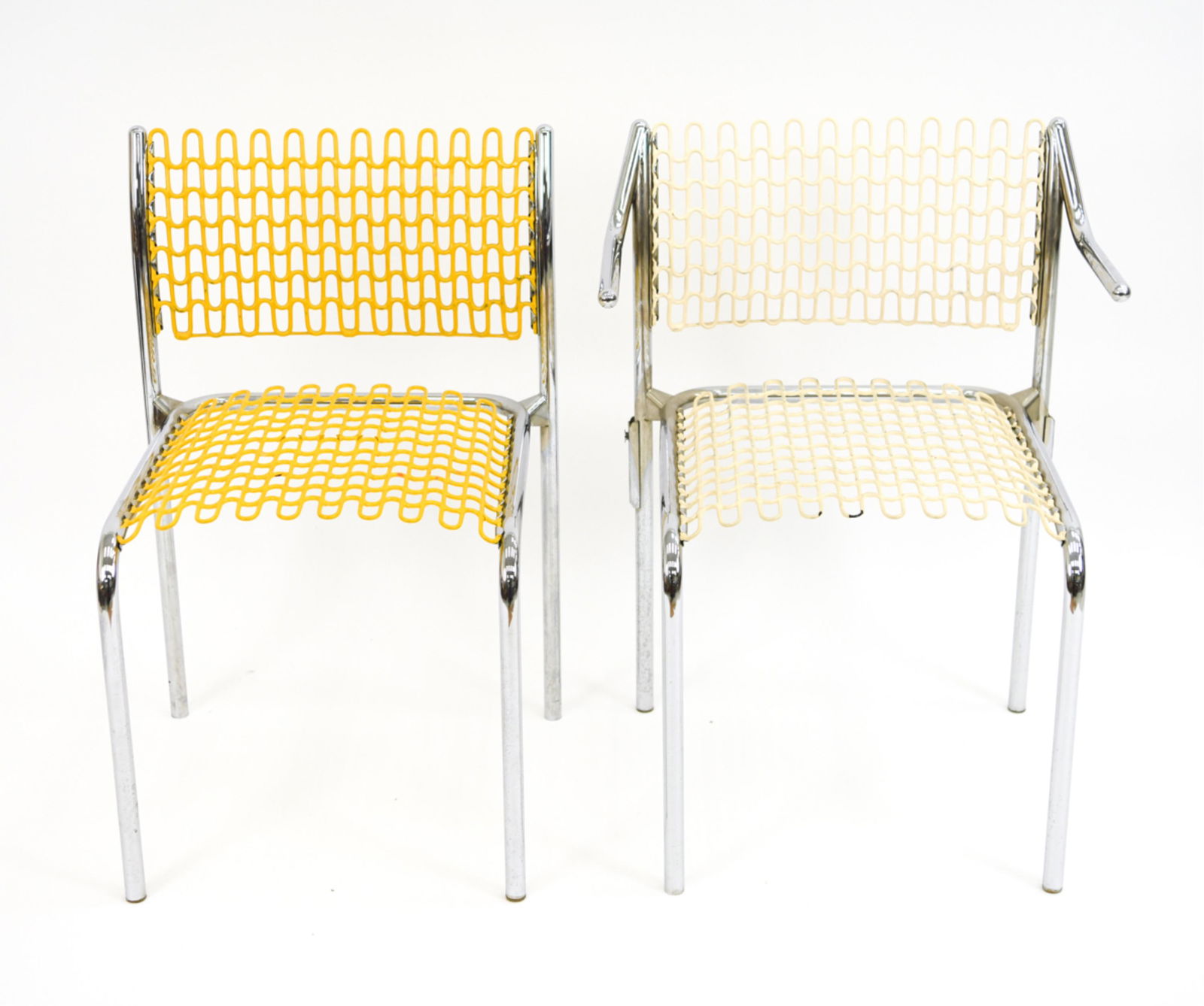 (2) DAVID ROWLAND "SOF-TECH" CHAIRS: With label underneath: A David Rowland Design for Thonet. Including one side chair in yellow, one armchair in off-white. Tubular steel, flexible PVC coated steel. Designed in 1979 by David Rowland (Am