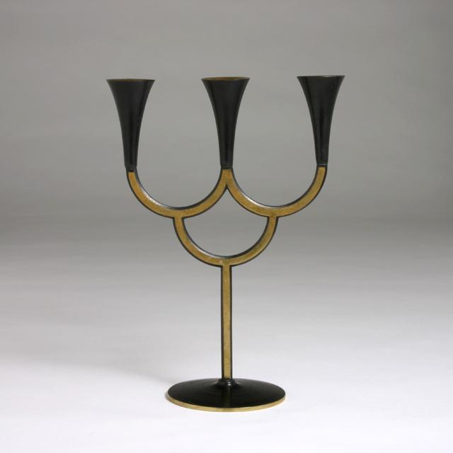 RICHARD ROHATSCH BRONZE CANDELABRA: Candelabra. Austria, c. 1928. Bronze, partially patinated. Stamped "Made in Austria" and with maker’s mark "RR" to underside. Dimensions: H 9.25" x W 6.75" x D 3.5" Condition: Few surface scratches 