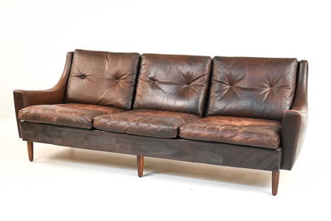 GEORG THAMS DANISH LEATHER SOFA: Leather Georg Thams Danish three-seater sofa. Dimensions: H 29" x W 75.5" x D 34" (seat height 16") Condition: Leather seat cushions of sofa show significant wear as do the rear cushions. The wear