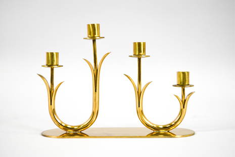 GUNNAR ANDER FOR YSTAD METAL CANDELABRA: Swedish mid-century brass flower-form 4-light candelabra. Designed by Gunnar Ander for Ystad-Metall, c. 1960's. Marked underneath. Dimensions: H 5" x W 7.25" x D 2.5" Condition: Some patina, light scr