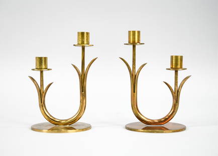 PAIR OF GUNNAR ANDER FOR YSTAD CANDLESTICKS: Pair of Swedish mid-century brass flower-form candlesticks. Designed by Gunnar Ander for Ystad-Metall, c. 1960's. Marked underneath. Dimensions: H 4.75" x W 3.25" x D 3" Condition: Tarnish, some verdi