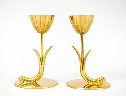 PAIR OF GUNNAR ANDER FOR YSTAD CANDLESTICKS: Pair of Swedish mid-century brass flower-form candlesticks. Designed by Gunnar Ander for Ystad-Metall, c. 1960's. Marked underneath. Dimensions: H 4" x Dia. 2.5" Condition: Few light surface scratches