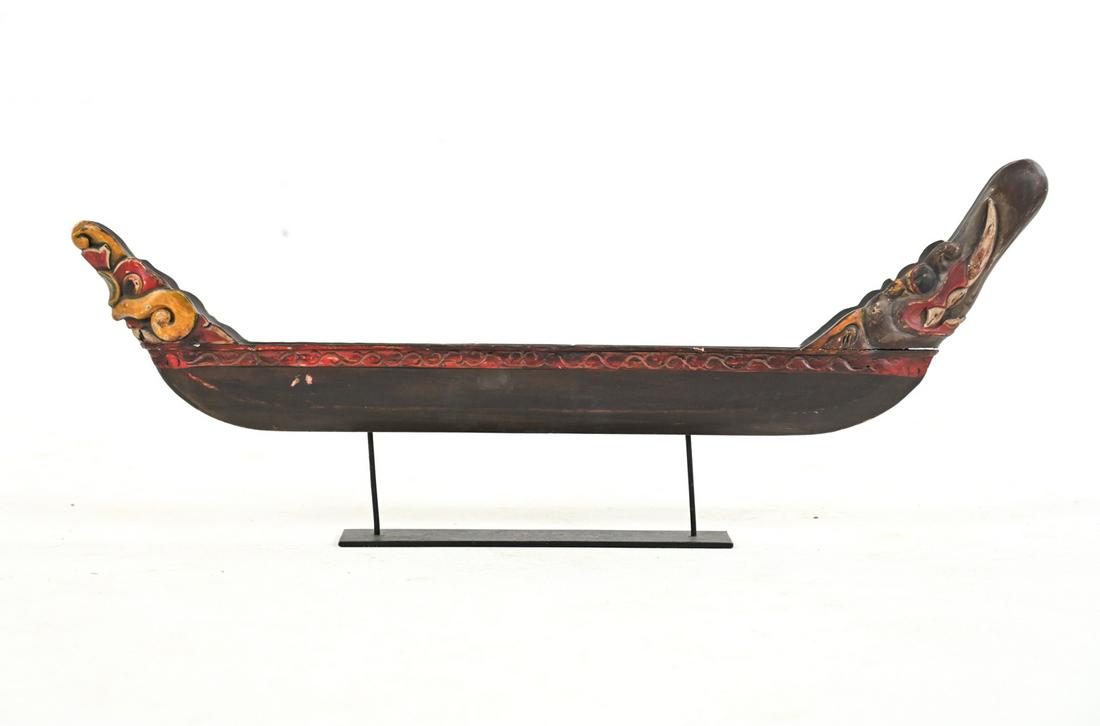 PAINTED COMPOSITE SHIP SCULPTURE: Painted composite ship sculpture on metal base. Dimensions: (On stand) H 14" x W 34.25" x D 2.5" Condition: Some cracks and chips, paint losses.
