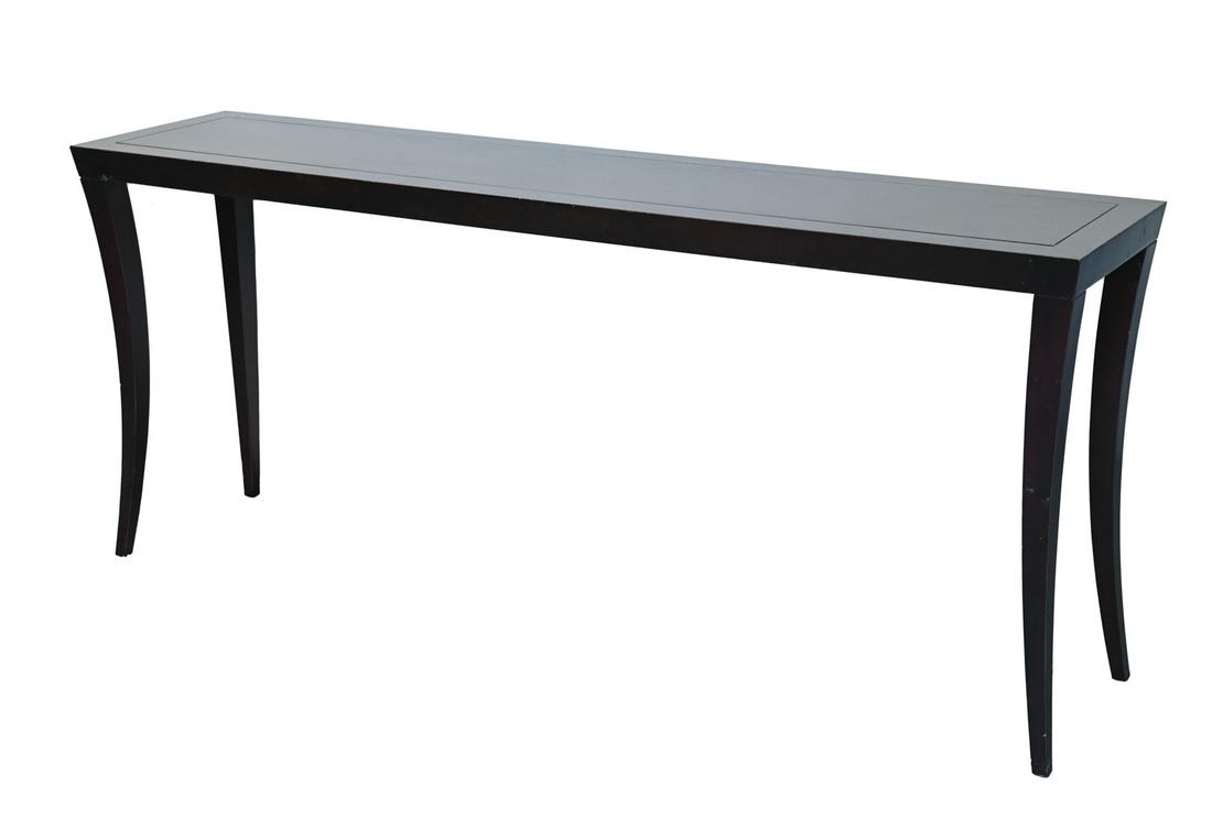 CONTEMPORARY SPLAYED LEG WOODEN CONSOLE: With black finish and saber legs. Dimensions: H 34" x W 80" x D 18" Condition: Scratches and wear to top surface. Rubs to corners. Nicks to corners and edges. Wear consistent with use.