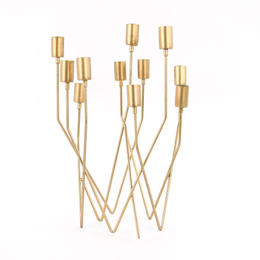 MODERNIST GOLD TONE CANDELABRA: Apparently unsigned. Dimensions: H 16" x W 11" x D 10" Condition: Residual wax from previous candles in some of the holders. Minor gold paint wear and typical wear and tear for its age. Weld break. Sl