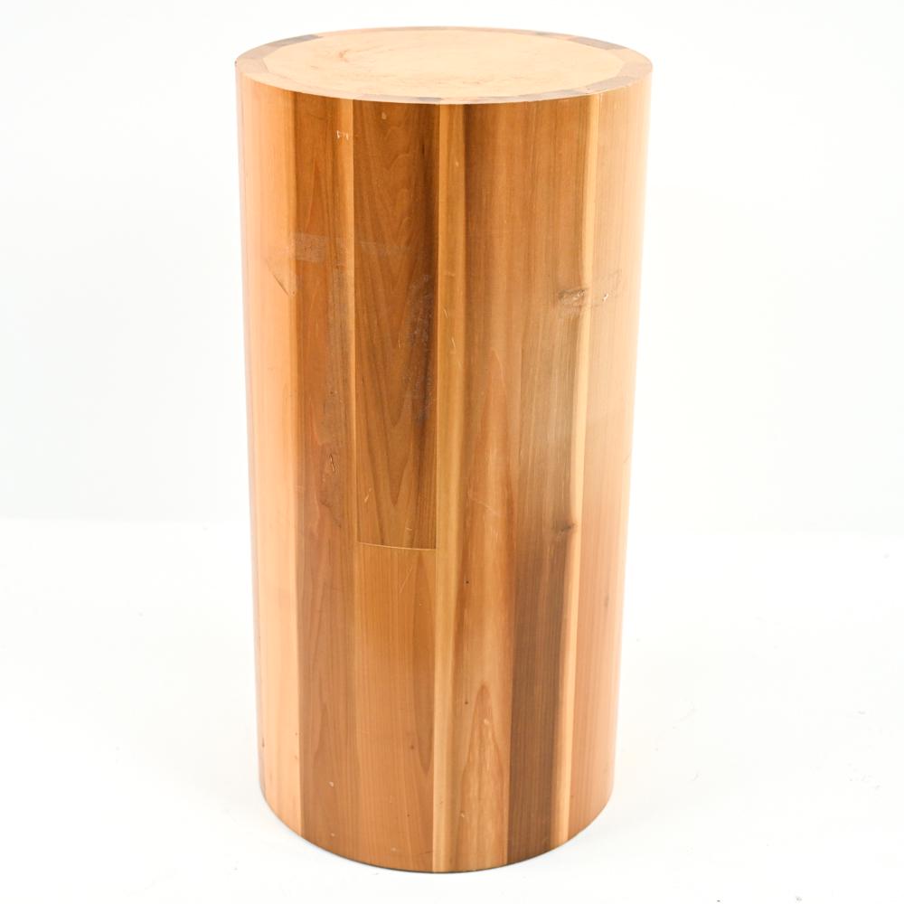 ROUND WOODEN PEDESTAL STAND: Nicely built, heavy duty round wooden pedestal, ideal for sculpture or plant display. Dimensions: H 30" x Dia. 15" Condition: Surface scratches and marks to the top of the pedestal. Minor marks to the