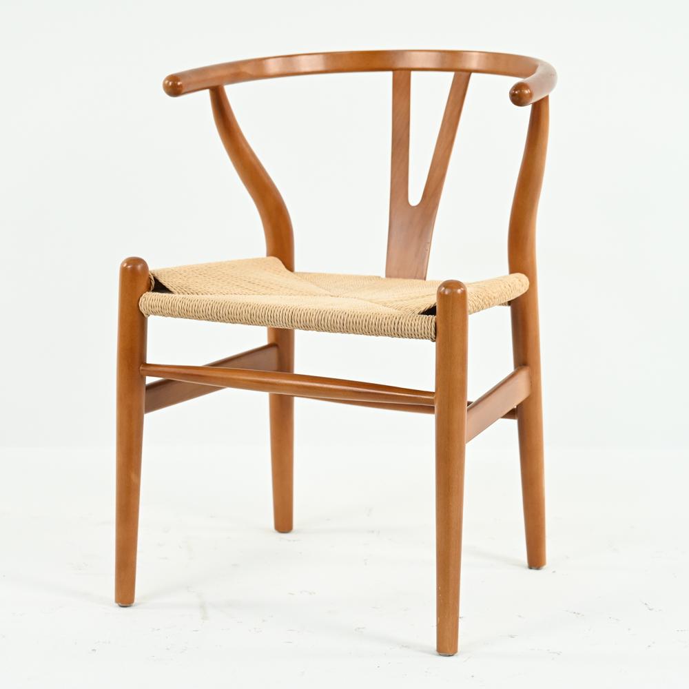 CONTEMPORARY HANS WEGNER-STYLE WISHBONE ARMCHAIR: Contemporary papercord seat. Dimensions: H 29" x W 21" x D 22", SH 17" Condition: Papercord shows minor soiling. Small marks and rubs to legs.