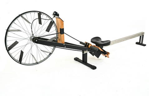 VINTAGE CONCEPT2 MODEL A INDOOR ROWER: A rare early model of the first widely affordable indoor "rowing ergometer" machine, produced by Concept2 from 1981-1986. Dimensions: H 35" x L 101" x W 18" Condition: Speedometer not working;