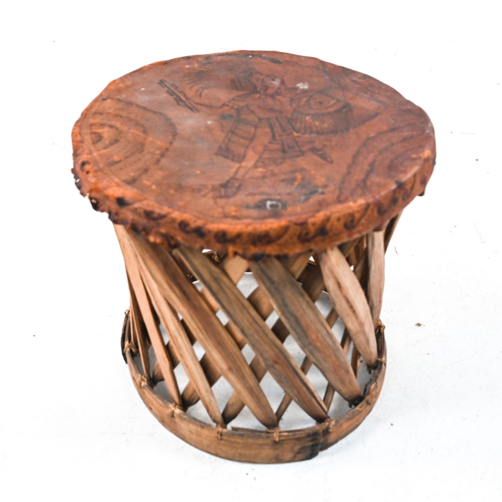 VINTAGE TRIBAL TOOLED LEATHER DRUM: Dimensions: H 16.5" x Dia. 17" Condition: As-is, need of some restorations or repairs; drum wobbly. Base with a few wood panels partially detached, 2-3 panels apparently missing. Hide not taut, with f