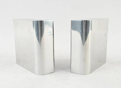 PAIR OF WILLIAM SKLAROFF RADIUS TWO BOOKENDS: With label underneath. Dimensions: H 6" x W 6" x D 2" Condition: Few scratches and small dings. One with corner impact damage.