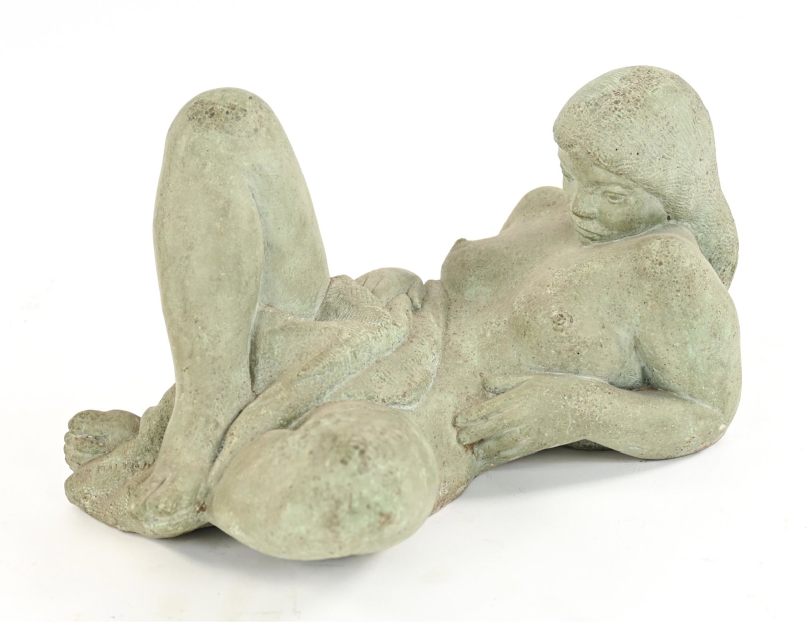 PETER C. DALTON (1894-1972) STONE NUDE SCULPTURE: Signed Peter Dalton, dated '45 near left foot. Reclining nude in cast composite stone, with faux verdigris finish. Dimensions: H 15" x W 20" x L 28" Condition: No issues to note.