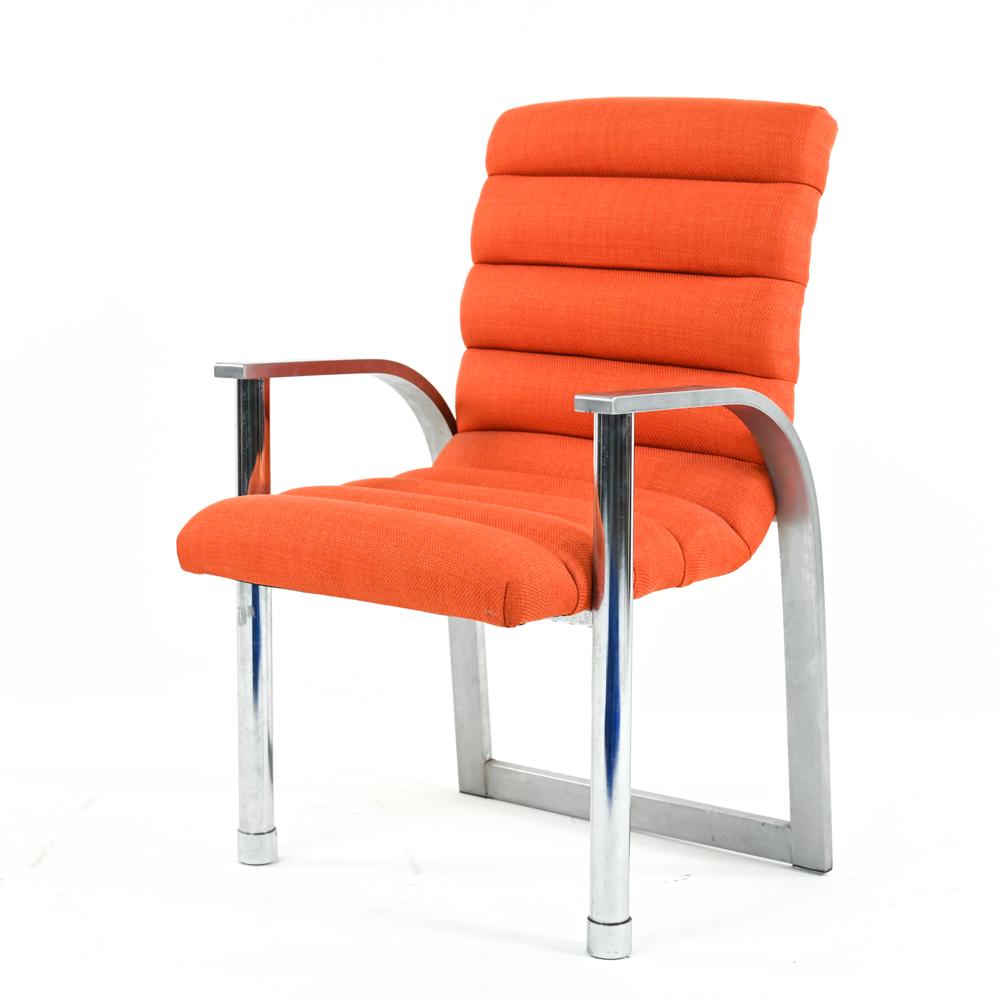 JAY SPECTRE FOR CENTURY "ECLIPSE" DINING ARMCHAIR: 1980's Postmodern Art Deco Revival "Eclipse" dining chair, designed by Jay Spectre for Century Chair Company. Polished and brushed steel with period woven burnt orange channel-tufted upholstery. Centu