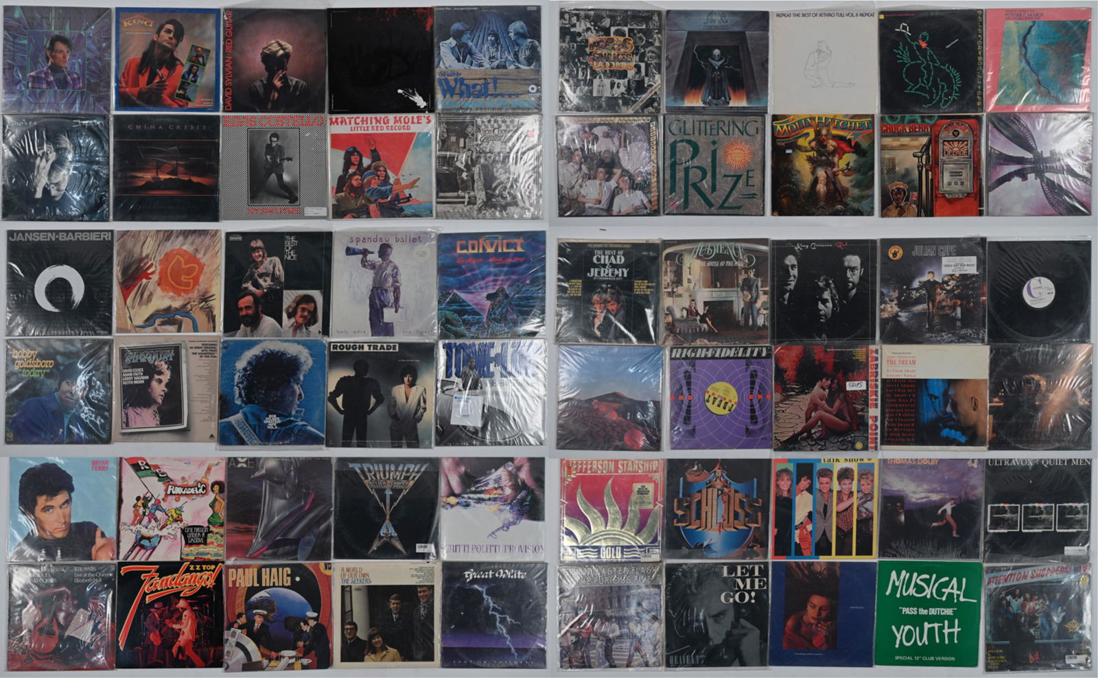 GROUPING OF (62) VINTAGE RECORDS: (62) Vinyl albums from a variety of genres, including classic rock, etc. Artists including The Doors, Bob Dylan, Tone-Loc, ZZ Top, and many more. Dimensions: H 12.25" x D 12.25" x W (total linear widt