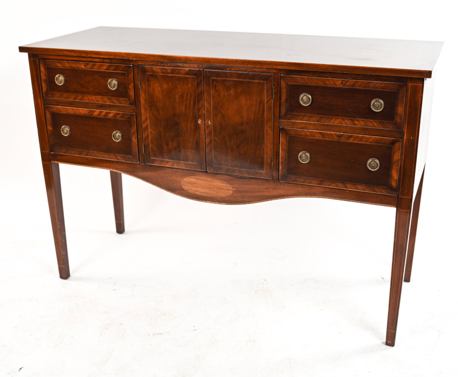 MAHOGANY FEDERAL STYLE SIDEBOARD: In the Federal Style. Dovetail drawer construction. Thin Veneer pinstripe accents. Dimensions: H 35.5" x W 52" x D 20" Condition: Skeleton keys are included for this unit. The top surface shows marks,
