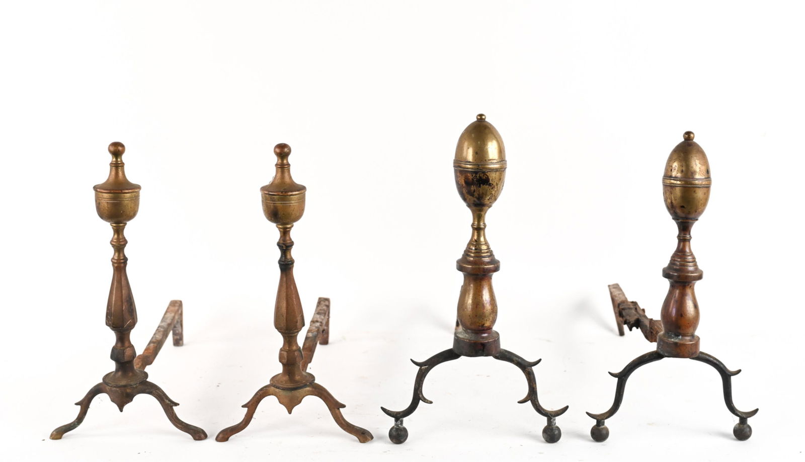 (2) PAIRS OF BRASS ANDIRONS: Dimensions: (Largest) H 17" x W 9" x D 20" Condition: Both sets of andirons show a patina, or darkening of the surface from age. Steel arms of andirons show rusting and surface deterioration.