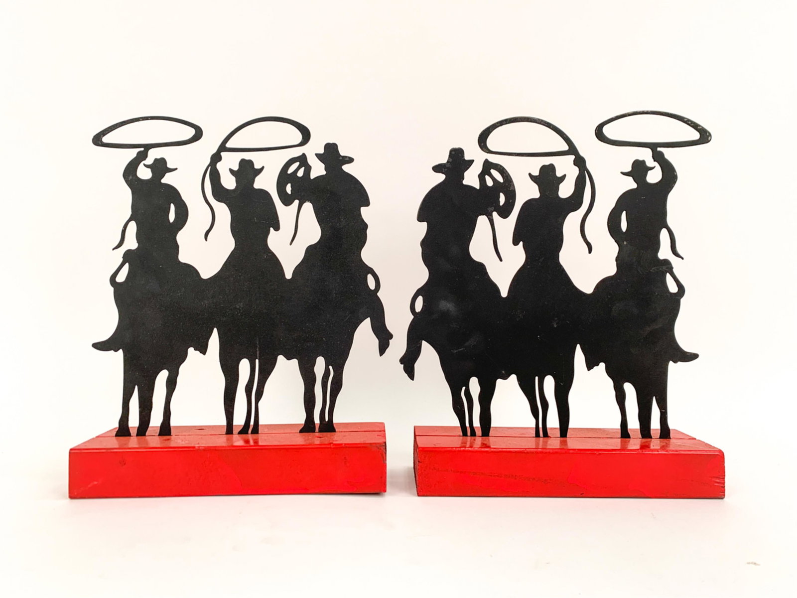 PAIR OF MODERN COWBOY SILHOUETTE SCULPTURES (1 of 5)