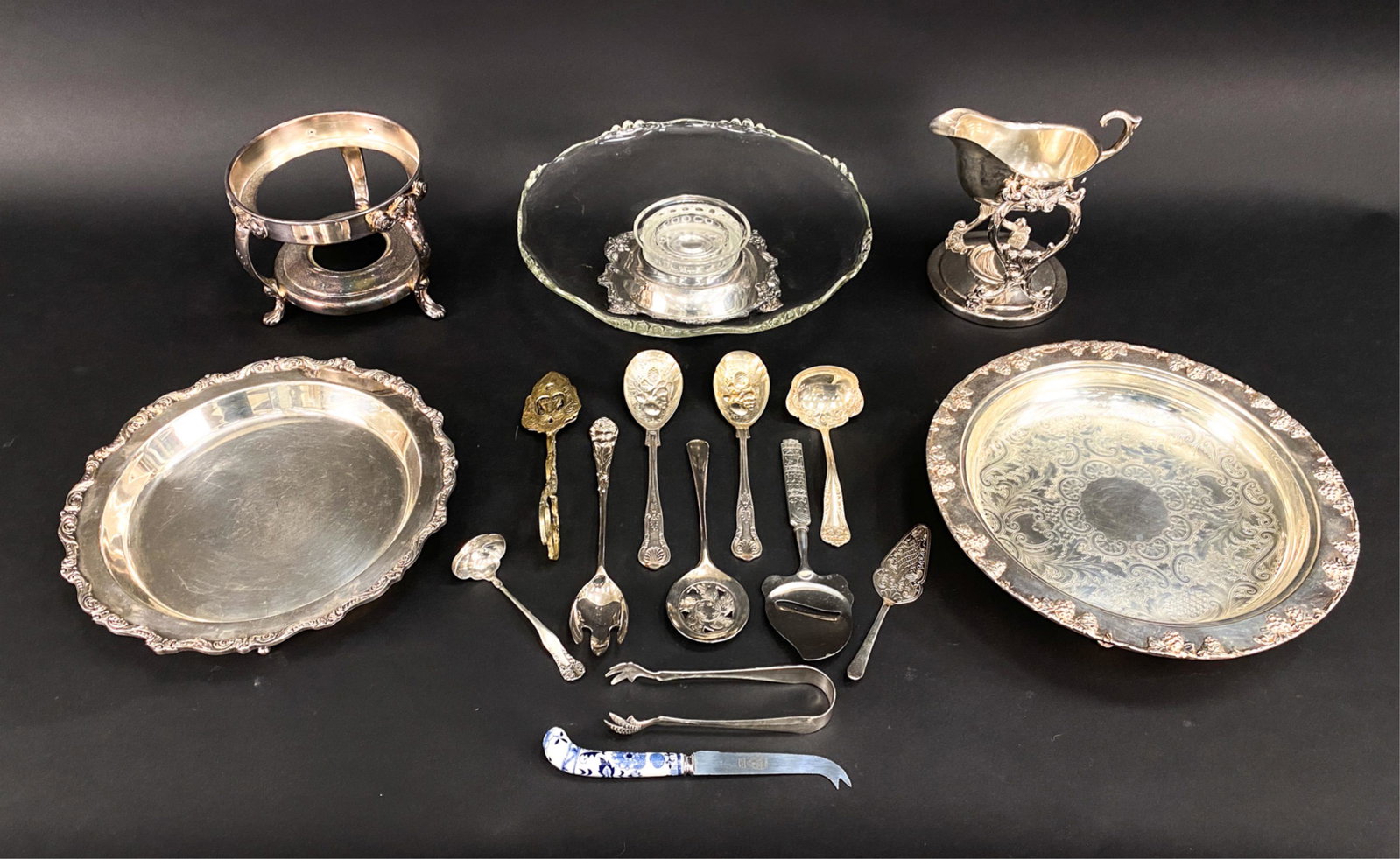 GROUPING OF SILVERPLATE: Including a silverplate and glass lazy-susan. Dimensions: (Largest) H 3.5" x D 13.25" Condition: Finish wear and surface marks consistent with use. Some tarnish.