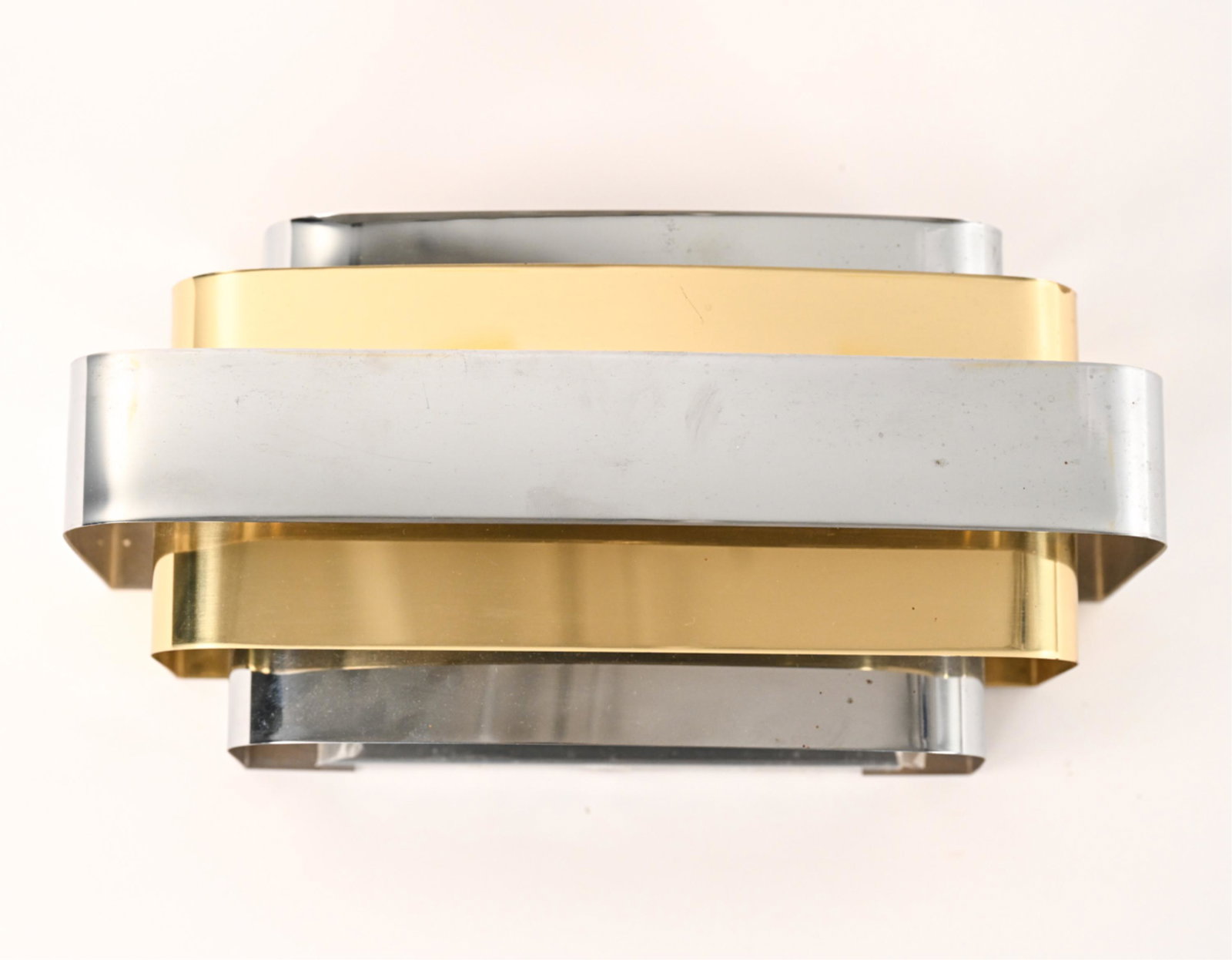 CHROME AND BRASS SCONCE: Dimensions: H 7.25" x W 14" x D 6.25" Condition: Minor scuffs, scratches and rubs. Wear consistent with age and use. Sconce not tested.