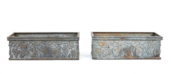 PAIR OF ANTIQUE CAST IRON PLANTER BOXES: Fine pair of planter boxes in cast iron, with grapevine motifs. Dimensions: H 10" x W 30" x D 10" Condition: Wear consistent with age and use; possible seam repairs; previously painted, with surface