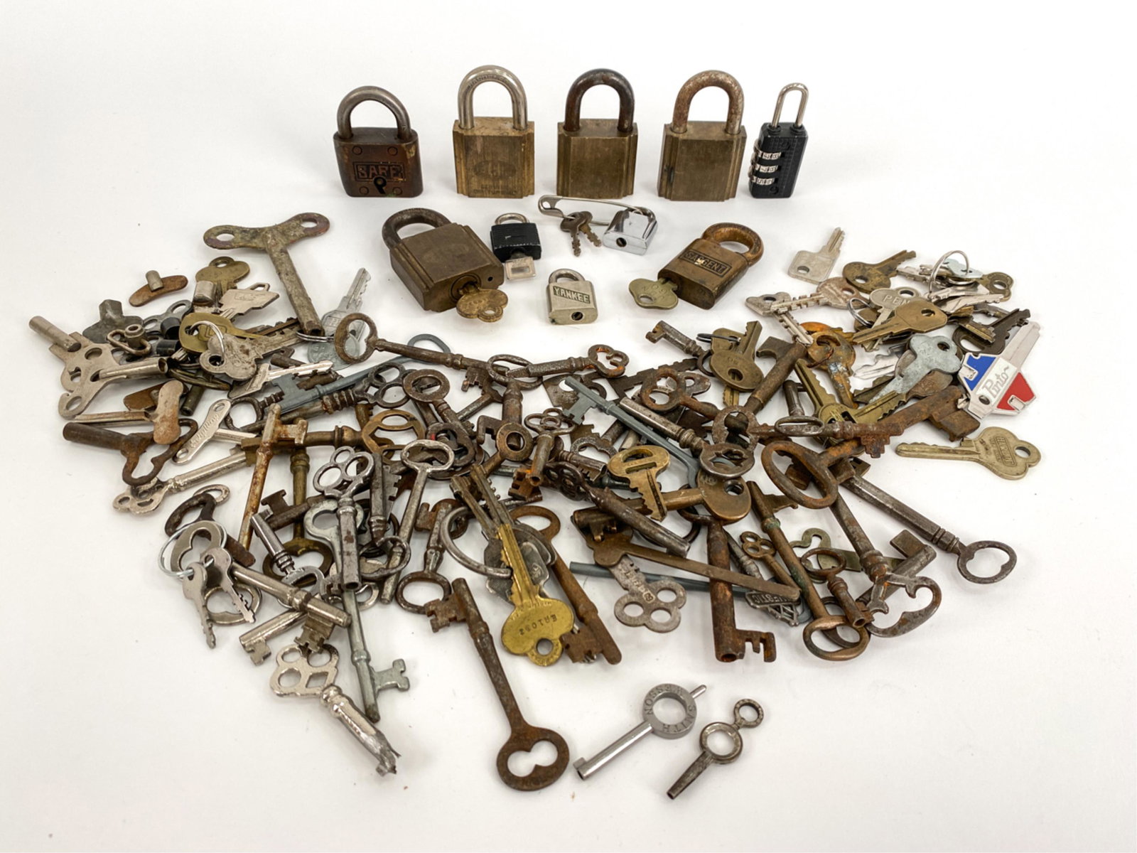 ANTIQUE KEYS & LOCKS COLLECTION: Around 140 antique and vintage keys and locks. Large collection includes: Antique & vintage clock keys, car keys, gun keys, skeleton keys, luggage, door keys etc. Dimensions: (Longest key) H 4" x W 1.