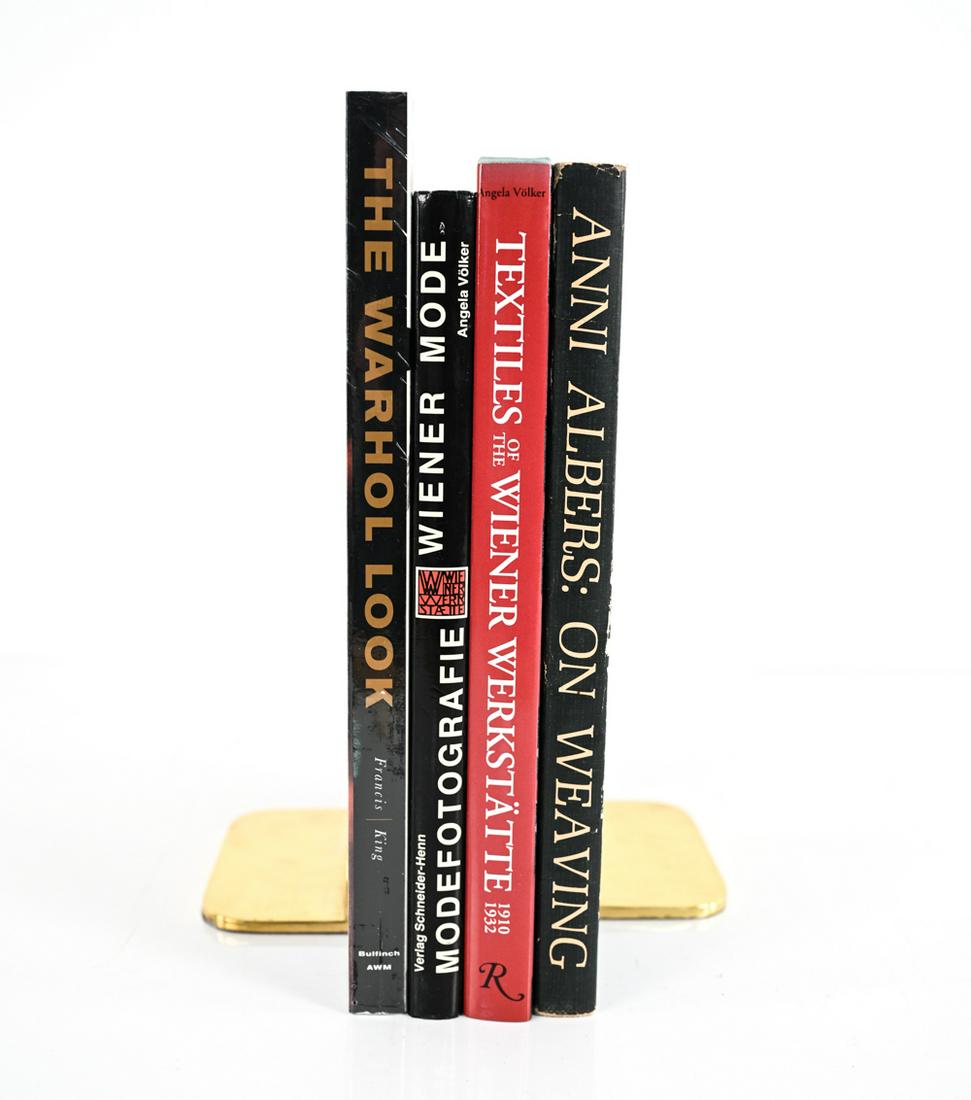 GROUPING OF FASHION & TEXTILE BOOKS: (4) Volumes in total, including (2) books on textiles and style of the Wiener Werkstatte. Dimensions: H (tallest) 12" x W (total linear width) 3.5" x D 9.5" Condition: Andy Warhol book New Old Stock i