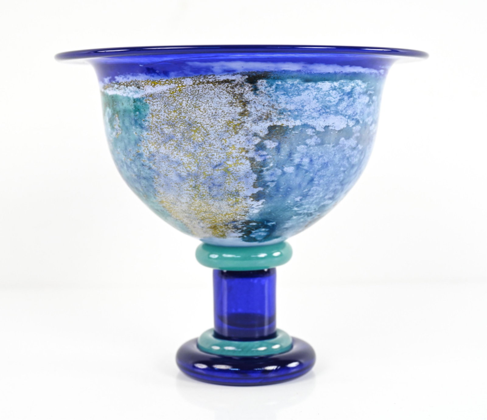 COSTA BODA GLASS CENTERPIECE BOWL: Signed on the bottom: Kosta Boda with artist signature and 59707. Dimensions: H 11.5" x Dia. 12.25" Condition: Minor scratches to bottom and side of base. Small white marks on one side of the base. We