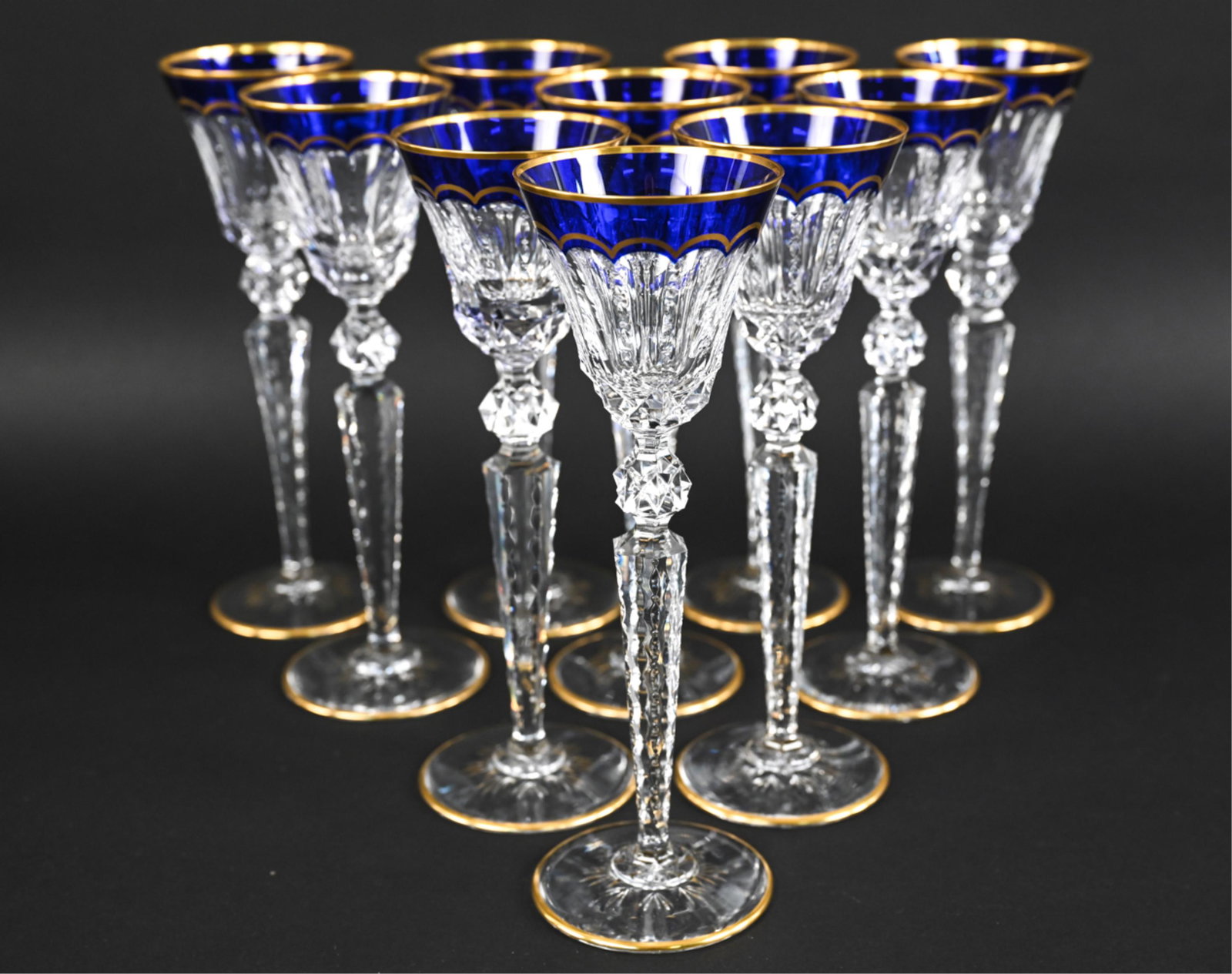 (10) ST. LOUIS CRYSTAL EXCELLENCE WINE GOBLETS: (10) Hock wine glasses from the "Excellence" pattern, with dark blue (cobalt) and gilt accents. Marked St. Louis Crystal underneath. Dimensions: H 10.25" x Dia. 3.5" Condition: No issues to note.