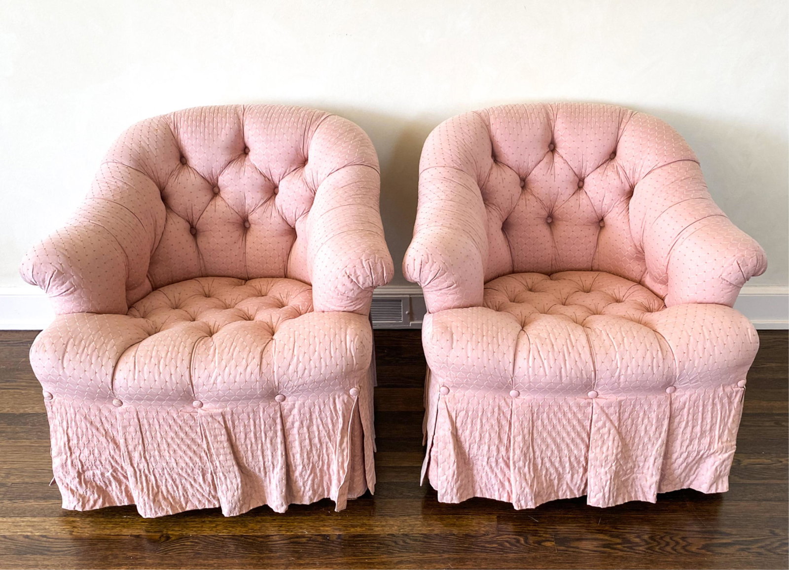 PAIR OF STICKLEY BUTTON-TUFTED LOUNGE CHAIRS: With Stickley label underneath. Dimensions: H 30" x W 33.5" x D 33" x SH 16.25" Condition: Sun fading, could use re-upholstery. Some seam separation to edge of one seat. Soiling.