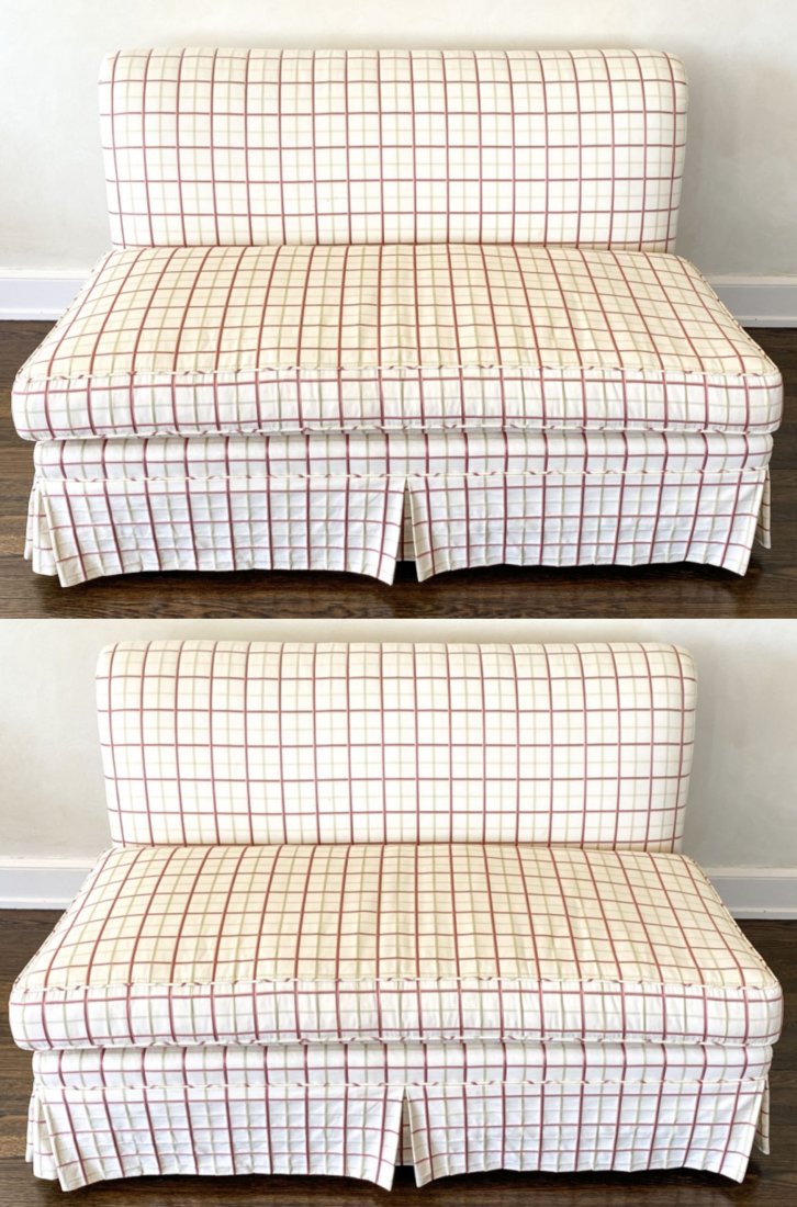 PAIR OF BANQUETTE LOVESEATS: Checkered upholstery. No labels. Dimensions: H 31.5" x W 52.75" x D 32" x SH 17" Condition: Soiling to upholstery; needs reupholstery. Wear consistent with use. Provenance: Purchased from Southport De