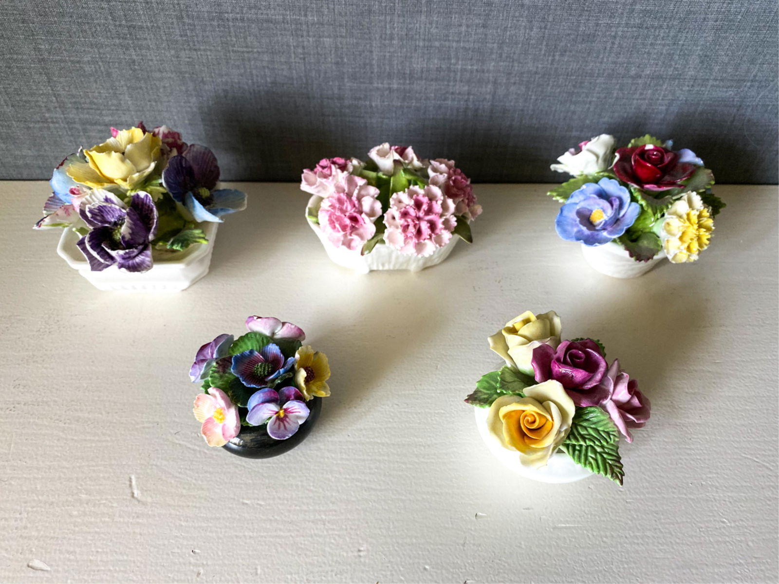 GROUPING OF ENGLISH PORCELAIN FLOWERS: Including Staffordshire, Denton England, Aynsley, Coalport, etc. Dimensions: (Largest) H 3" x W 4" x D 4" Condition: Few chips.