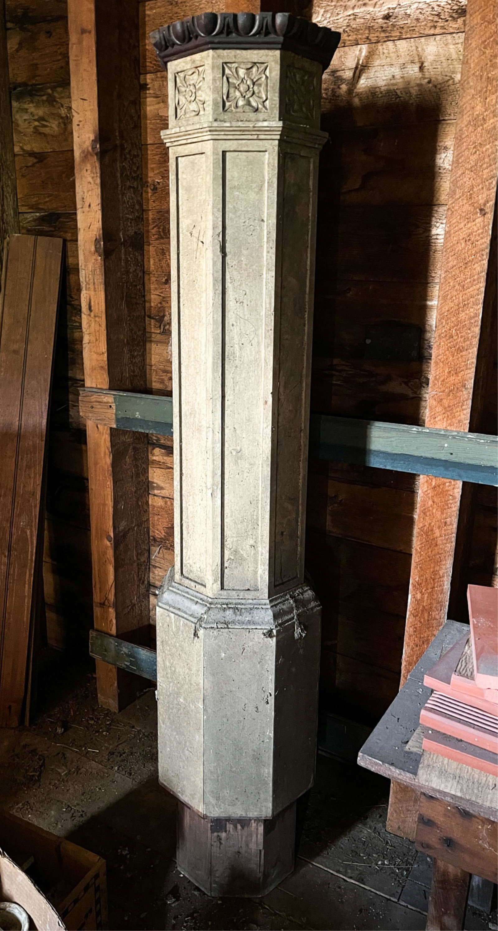 ANTIQUE NEWEL POST ARCHITECTURAL SALVAGE: Antique newel post with carved floral designs on top. Dimensions: H 58" x Dia. 12" Condition: Wear consistent with age and use.