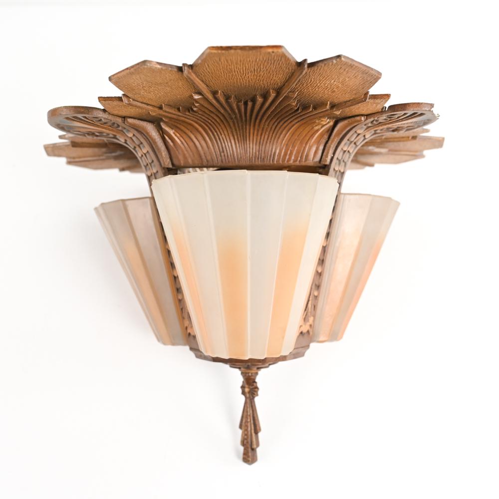 ART DECO BEARDSLEE CEILING-MOUNT LIGHT FIXTURE: Rare ceiling-mounted light fixture of the Art Deco Period, in highly stylized gilt-patinated metal with original striped frosted glass slip shades, signed "Beardslee Chandelier Mfg. Co. Chicago" on fi