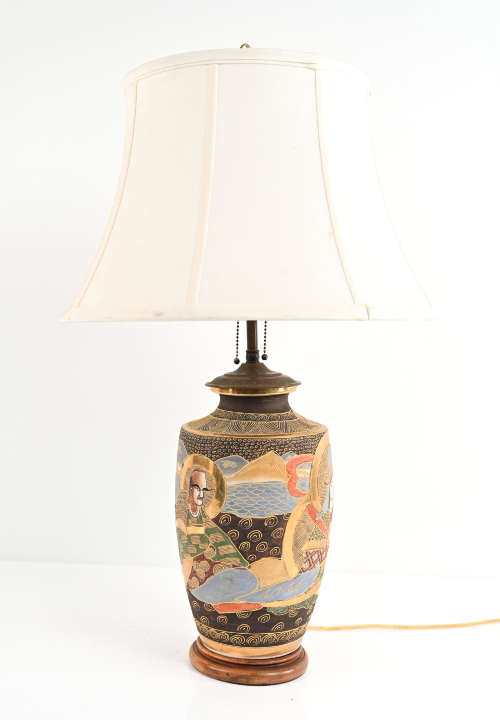 JAPANESE PORCELAIN VASE AS LAMP: Wooden base. Dimensions: (Incl. shade) H 29" x Dia. 17" Condition: Small spots of soiling to shade. Few scuffs and marks to porcelain. Light wear.