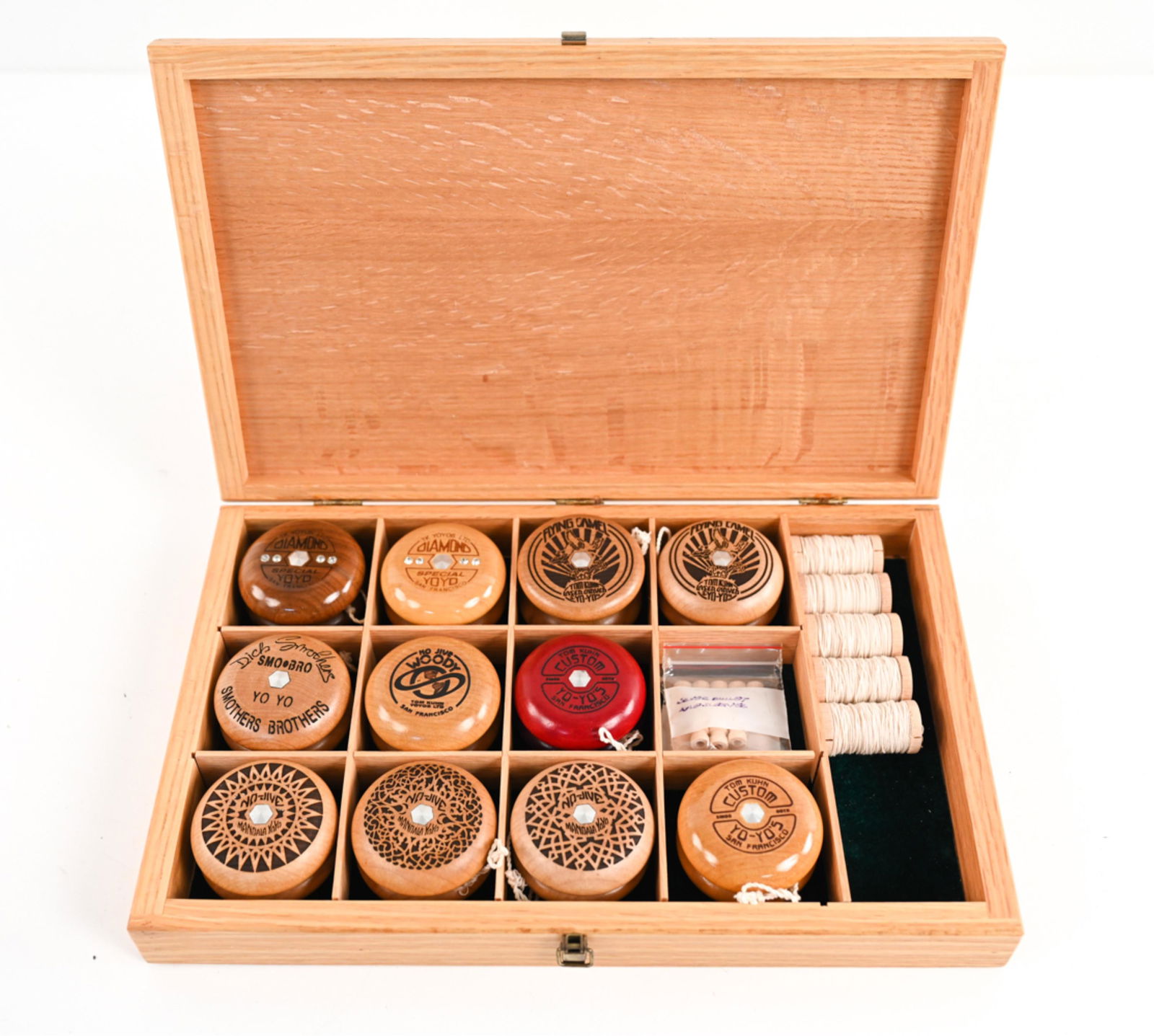 GROUPING OF TOM KUHN CUSTOM WOODEN YOYOS (1 of 15)