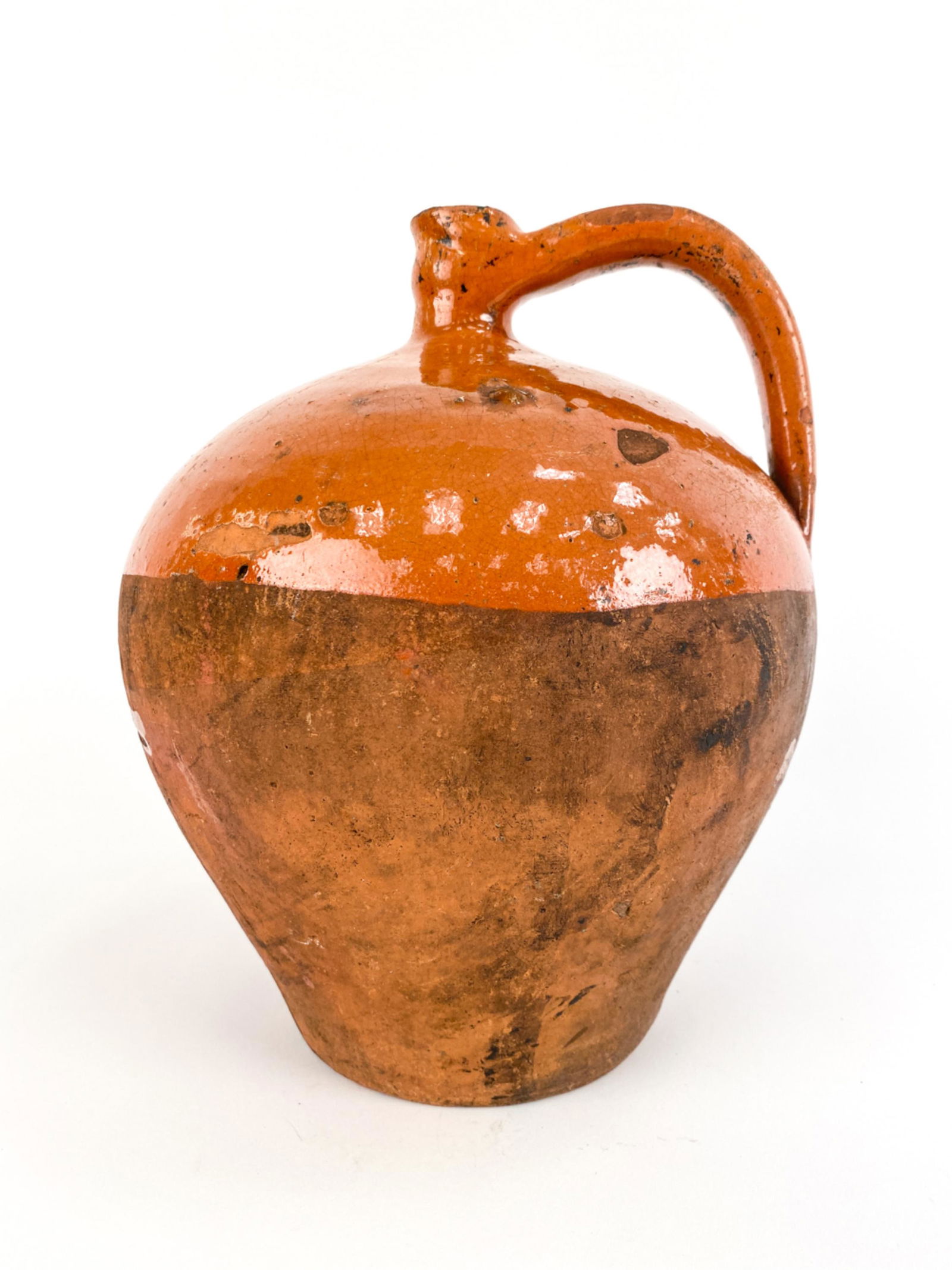 FRENCH ANTIQUE TRANSPORT POTTERY: Used to obtain water from a well. Glaze color is unusual from Albi, late 18th century. Dimensions: H 10.25" x Dia. 8.25" Condition: Chips, crazing, some glaze losses, scratches, and marks. Cork broken