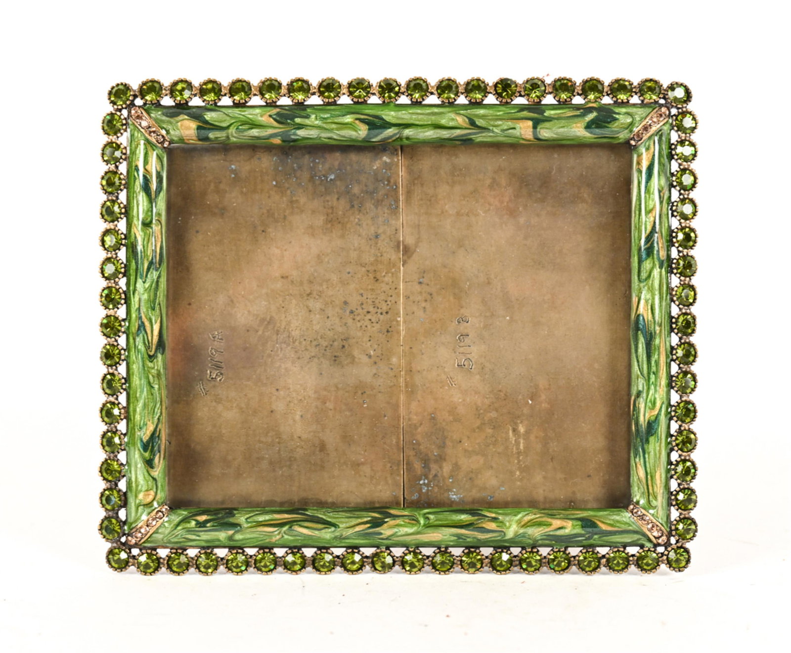 JAY STRONGWATER ENAMEL & JEWELED PICTURE FRAME: Green enamel and glass jewels. With original dust bag. Marked Jay Strongwater verso. Dimensions: (Overall) H 6.25" x W 9.25", (Opening) H 5" x W 3.75" Condition: No issues to note.